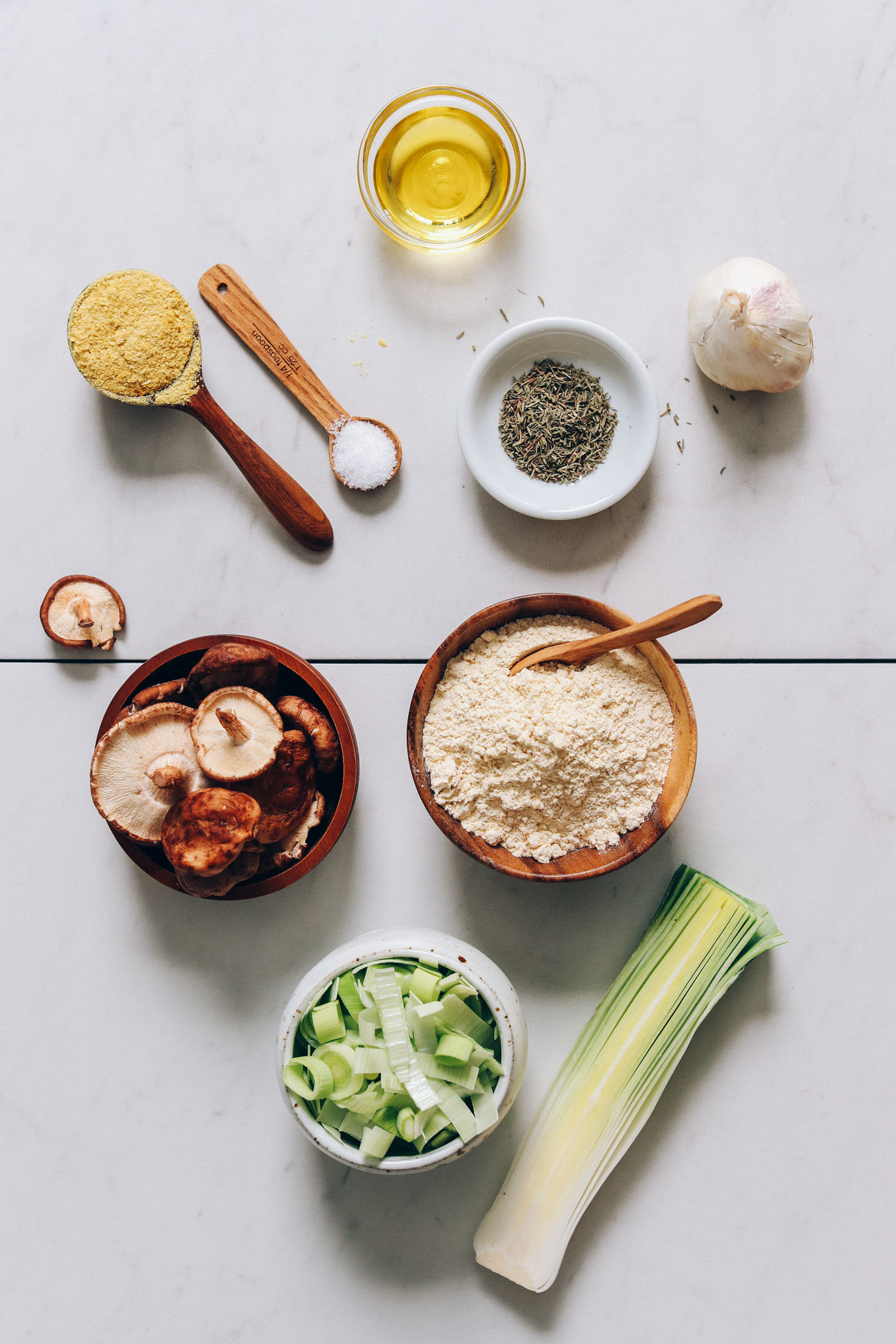 Nutritional yeast, salt, olive oil, thyme, garlic, chickpea flour, leek, and mushrooms