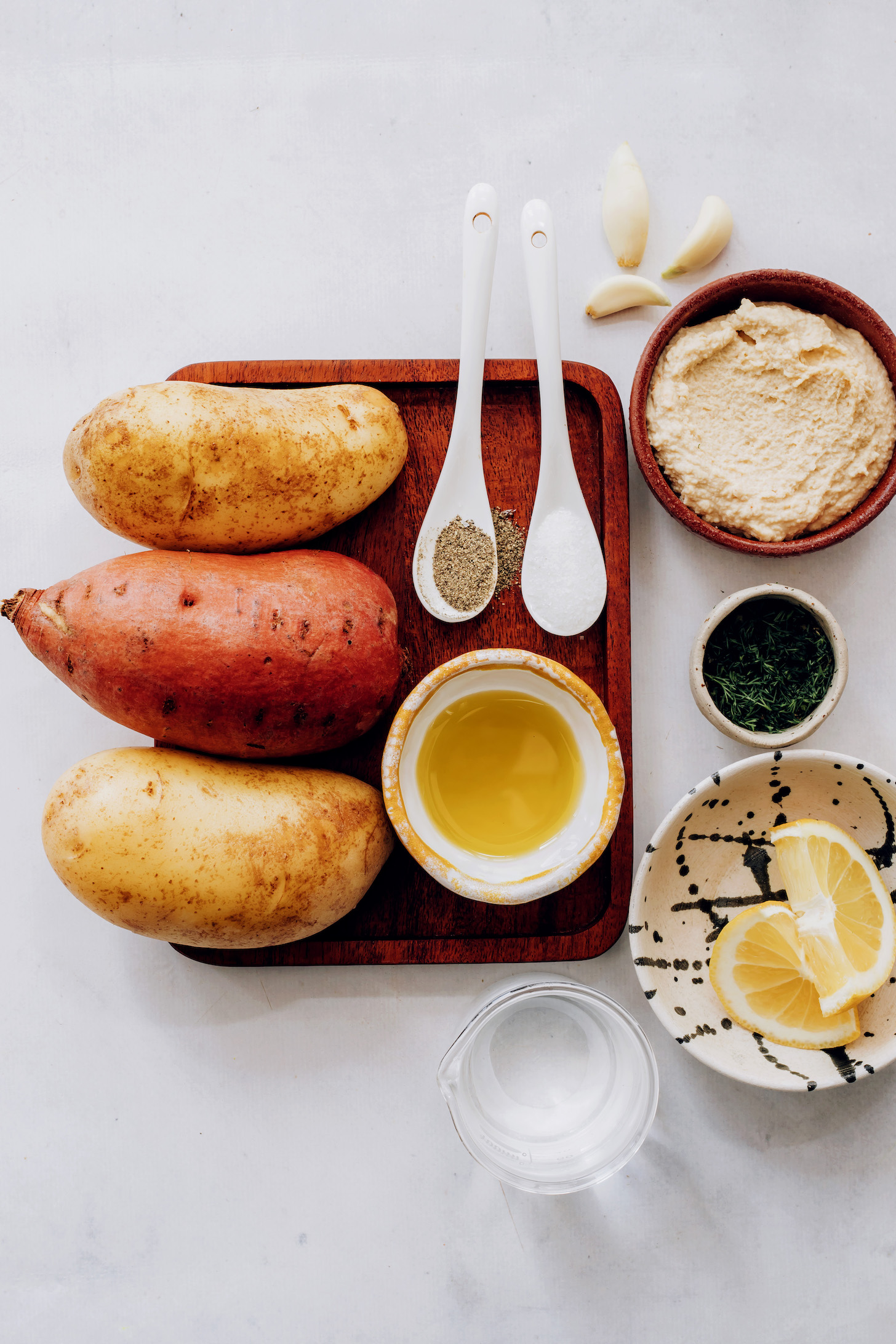 Potatoes, salt, pepper, avocado oil, garlic, hummus, dill, lemon, and water