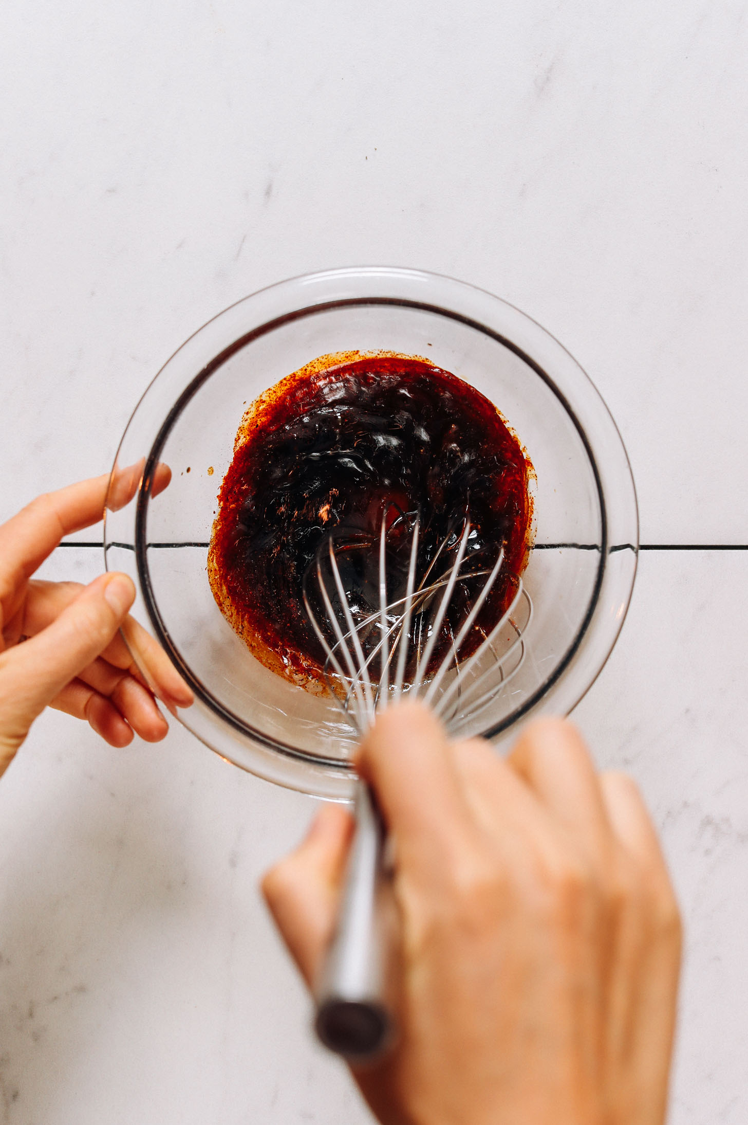 Whisking a marinade for tempeh bacon