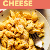 Bowl of vegan and gluten-free 20-minute mac and cheese with a fork in it