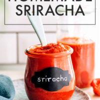Spoon in a jar of easy homemade sriracha