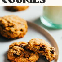 Plate of vegan gluten-free oatmeal raisin cookies