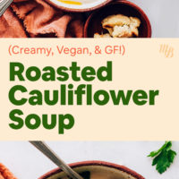 Bowls of vegan and gluten-free roasted cauliflower soup with pieces of roasted cauliflower, pine nuts, and cilantro