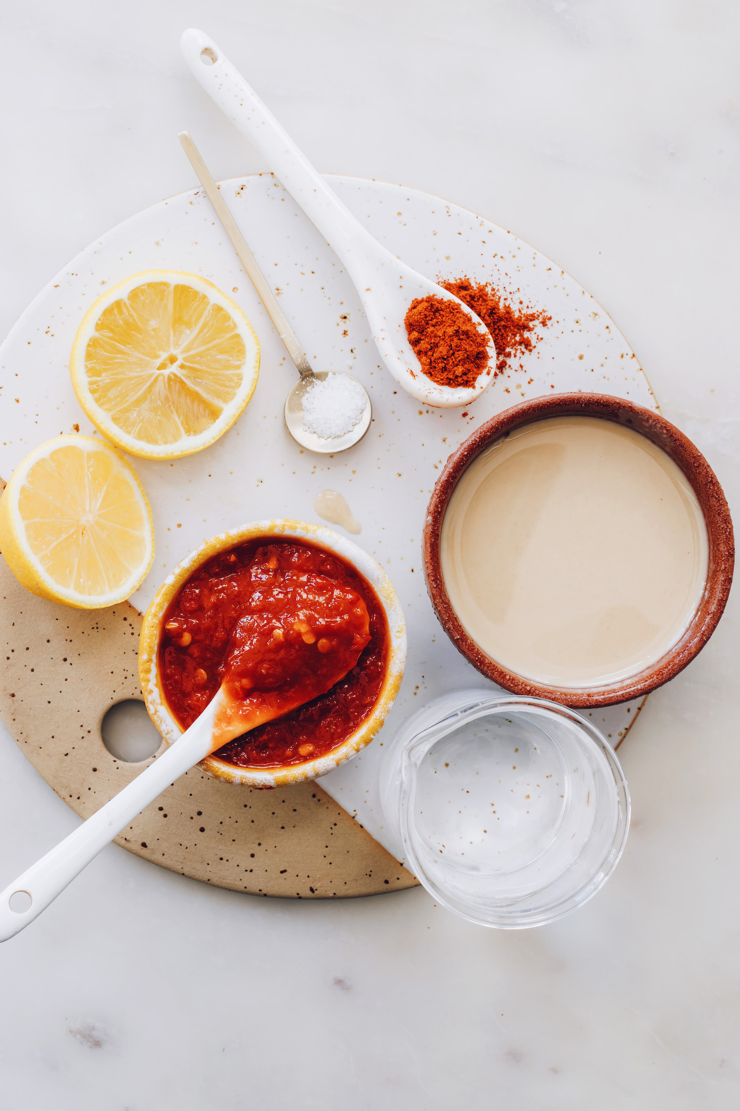 Harissa sauce, lemons, sea salt, smoked paprika, tahini, and water