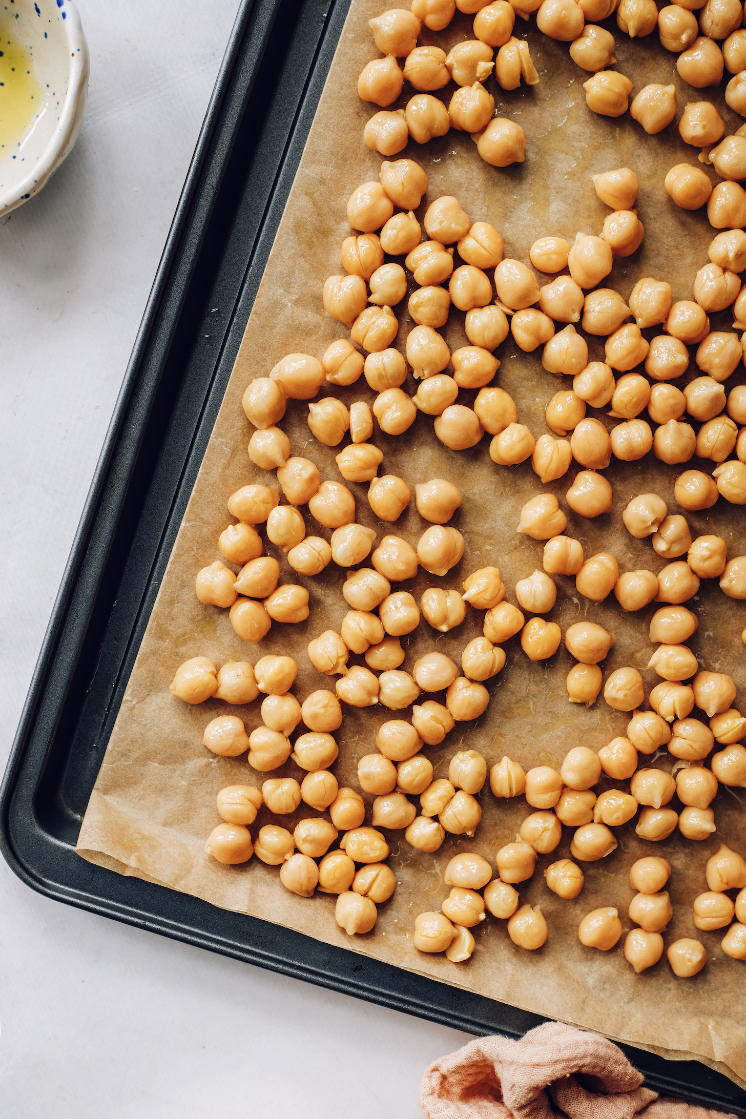 Baking sheet of chickpeas with avocado oil