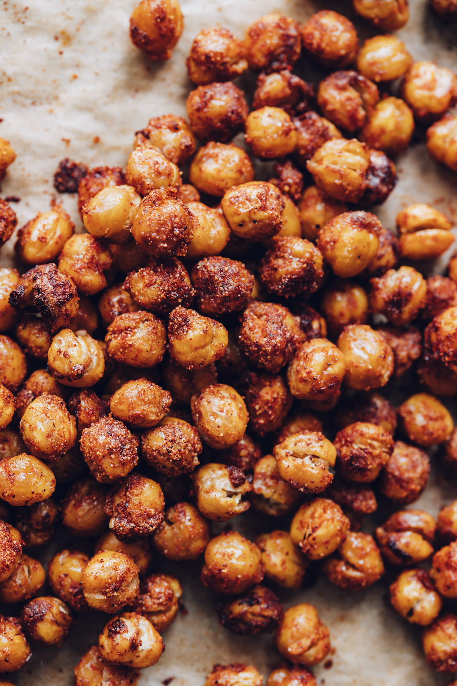 BBQ roasted chickpeas on a parchment-lined baking sheet