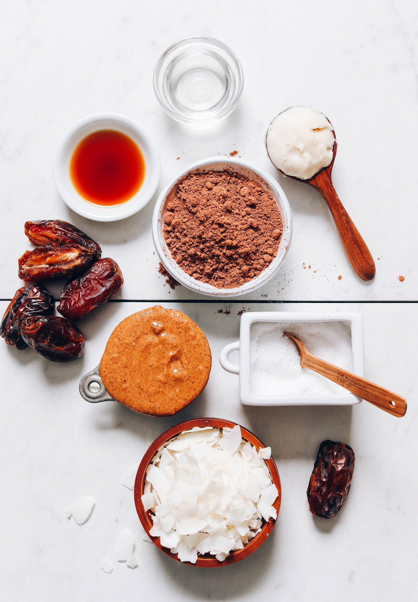 Dates, almond butter, coconut, salt, cacao powder, coconut butter, and coconut oil