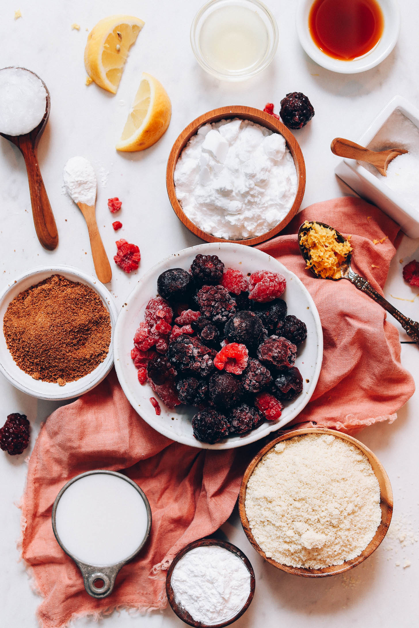 Frozen berries, coconut sugar, arrowroot powder, lemon zest, coconut milk, vanilla, apple cider vinegar, potato starch, almond flour, salt, and coconut oil