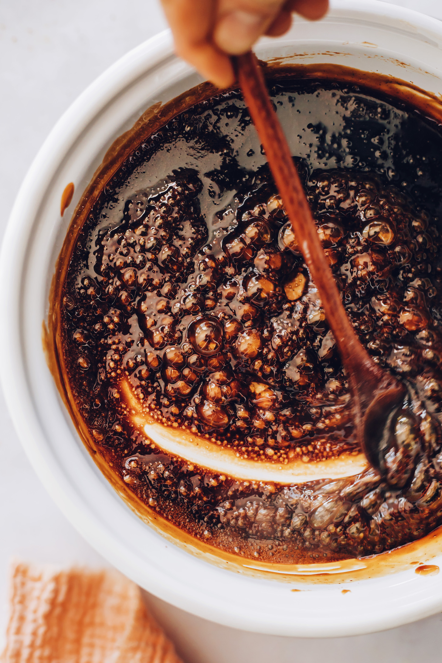 Saucepan of bubbling coconut sugar caramel sauce