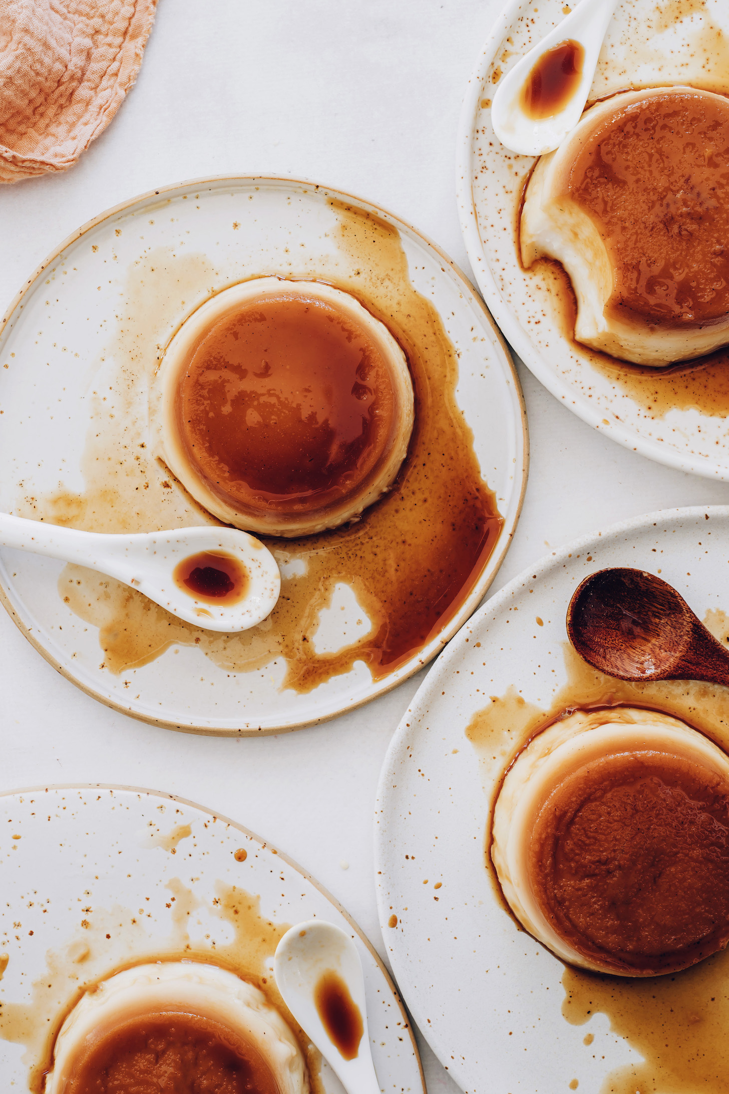 Top-down photo showing the caramel layer on top of portions of vegan flan