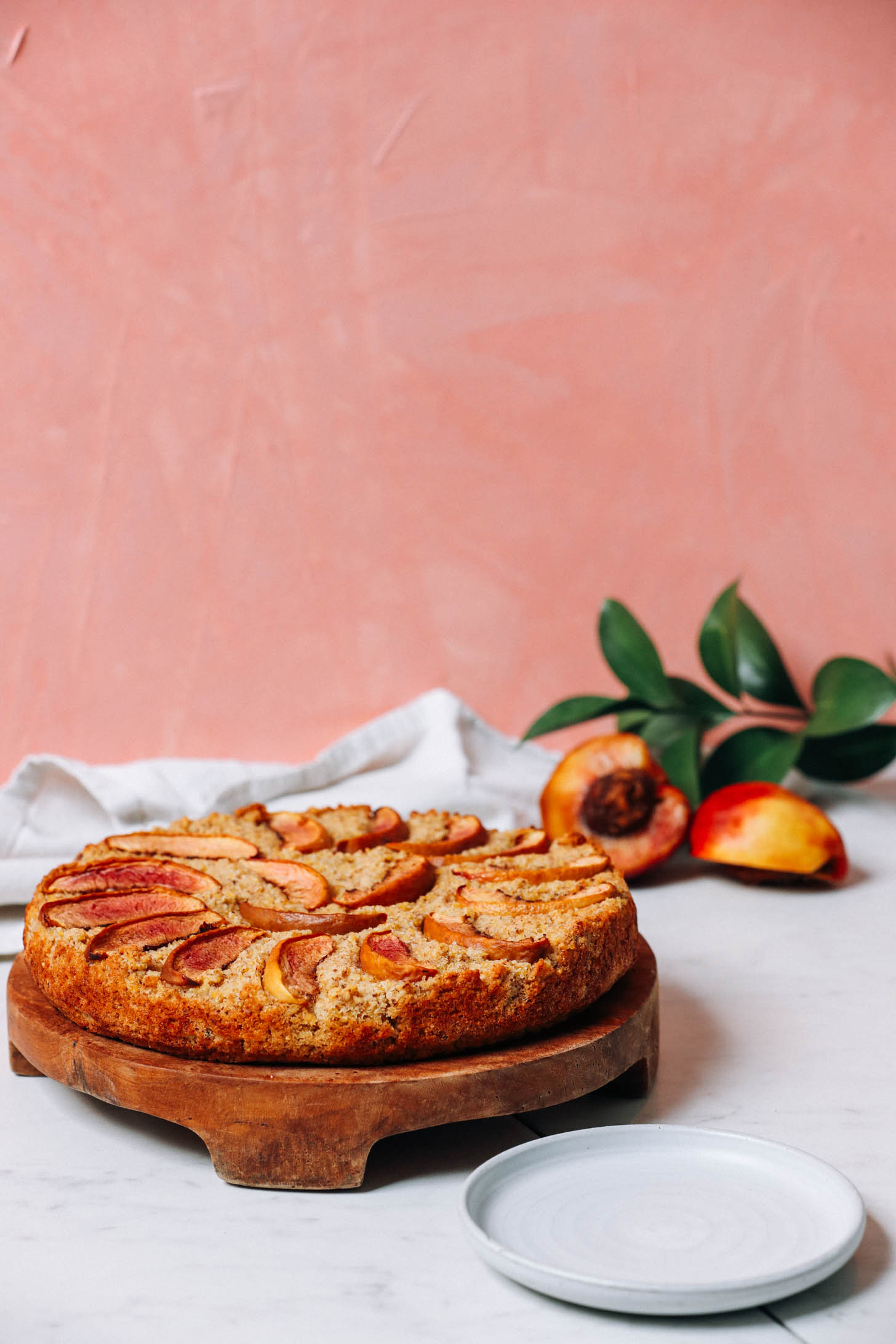 Tray of millet breakfast cake with nectarines