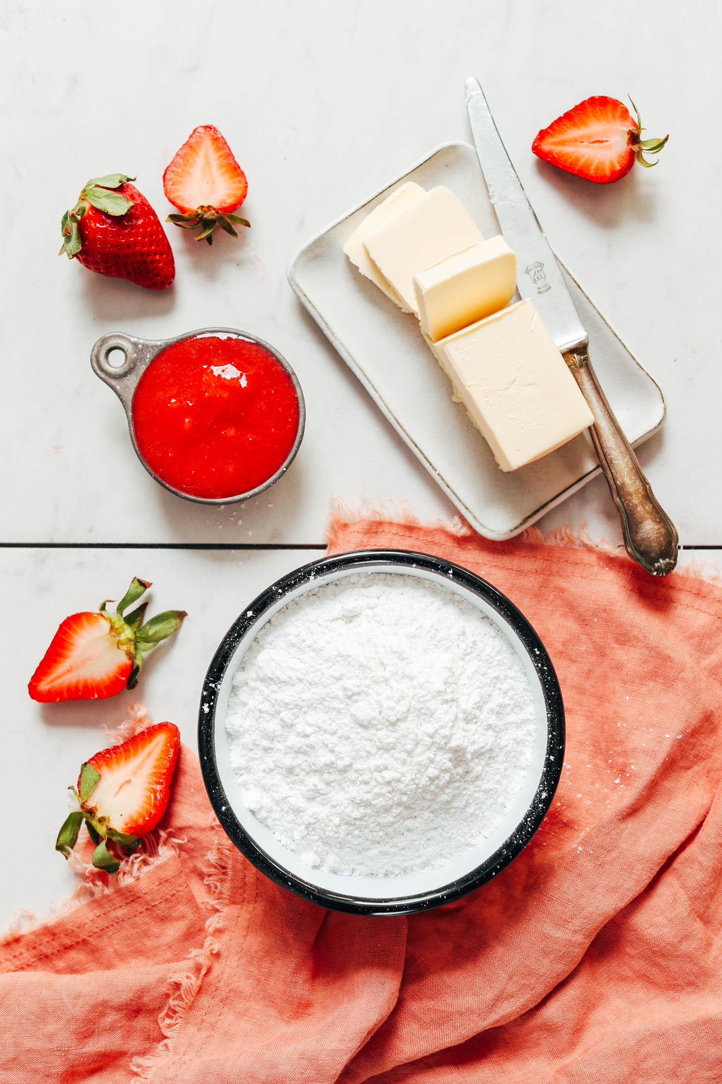 Fresh strawberries, powdered sugar, vegan butter, and strawberry compote