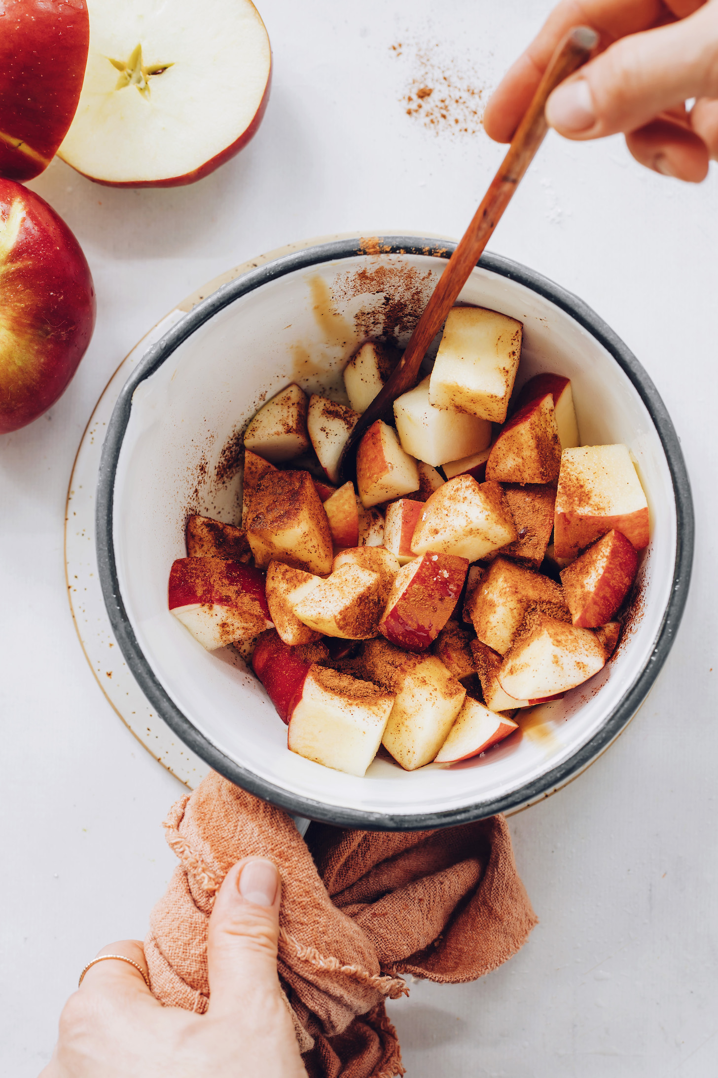 Saucepan of chopped apples with cinnamon