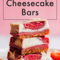 Stack of vegan and gluten-free strawberry cheesecake bars