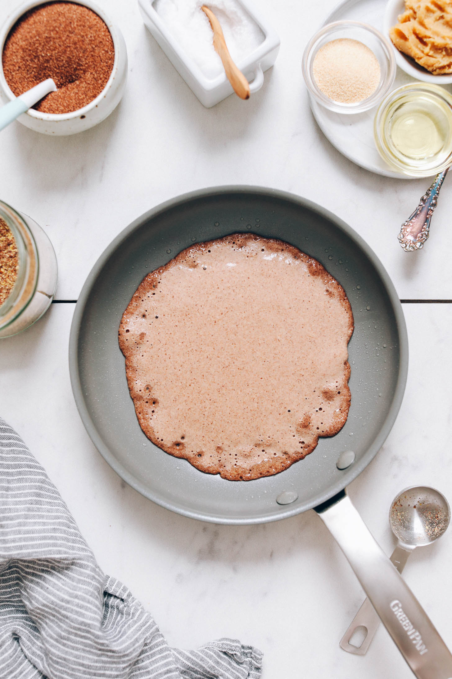 Cooking a teff crepe in a non-stick skillet