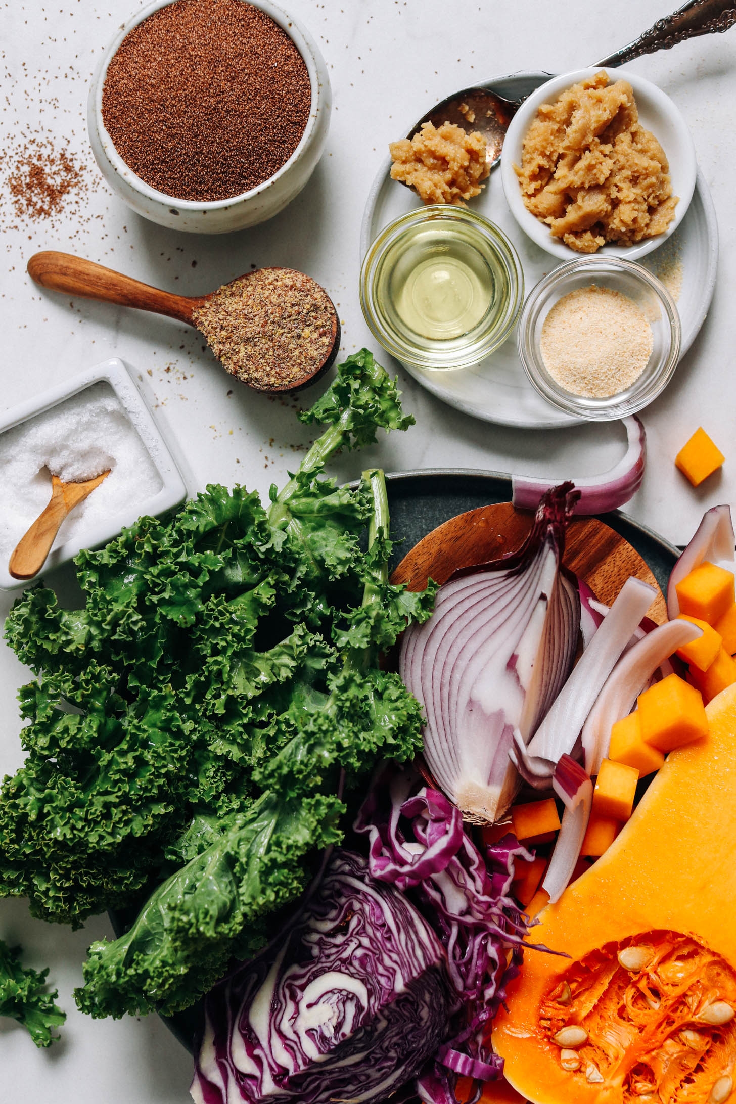 Butternut squash, red onion, cabbage, kale, salt, flaxseed meal, avocado oil, garlic powder, miso, and whole teff grains