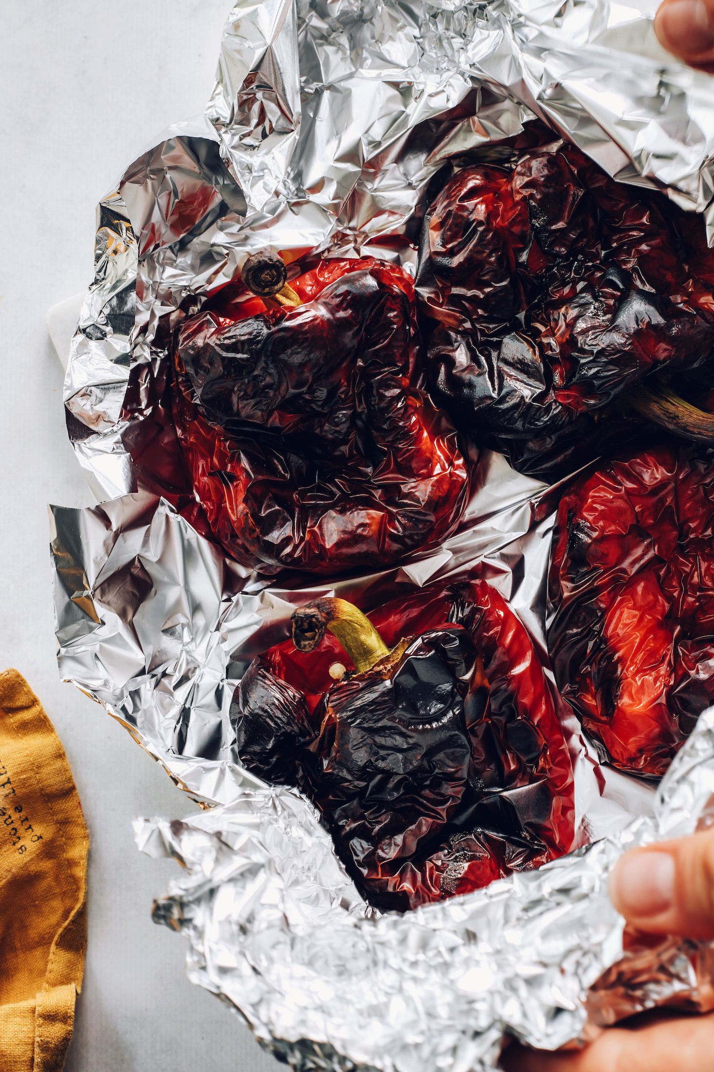 Roasted red bell peppers in foil