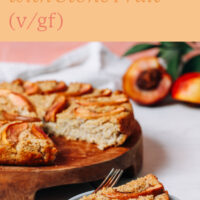 Plate and slice of vegan and gluten-free fluffy millet breakfast cake with a fork on the side