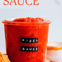 Labeled jar of easy vegan homemade pizza sauce