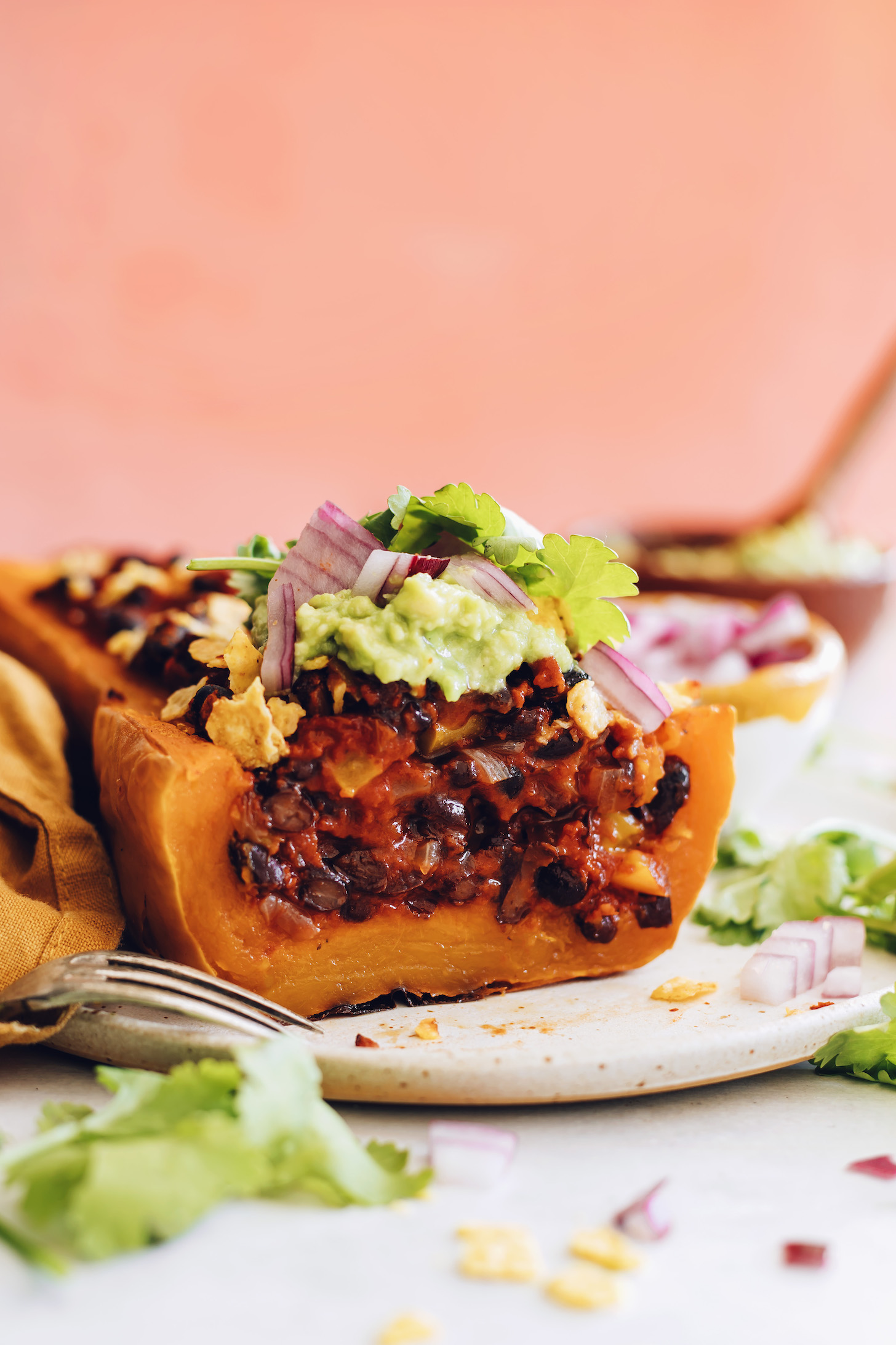 Close up shot of a sliced stuffed butternut squash