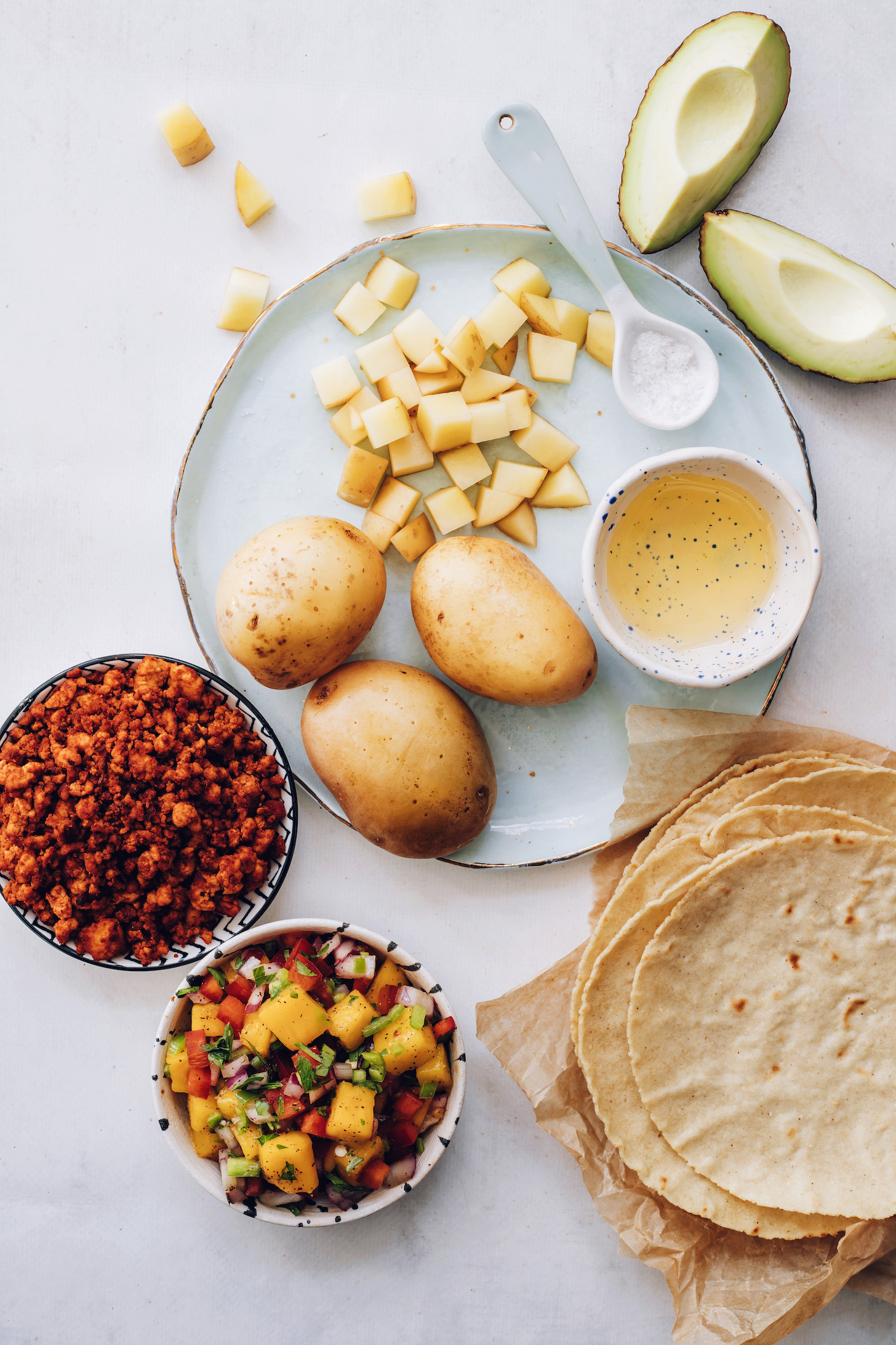 Potatoes, avocado, salt, avocado oil, tortillas, salsa, and vegan chorizo