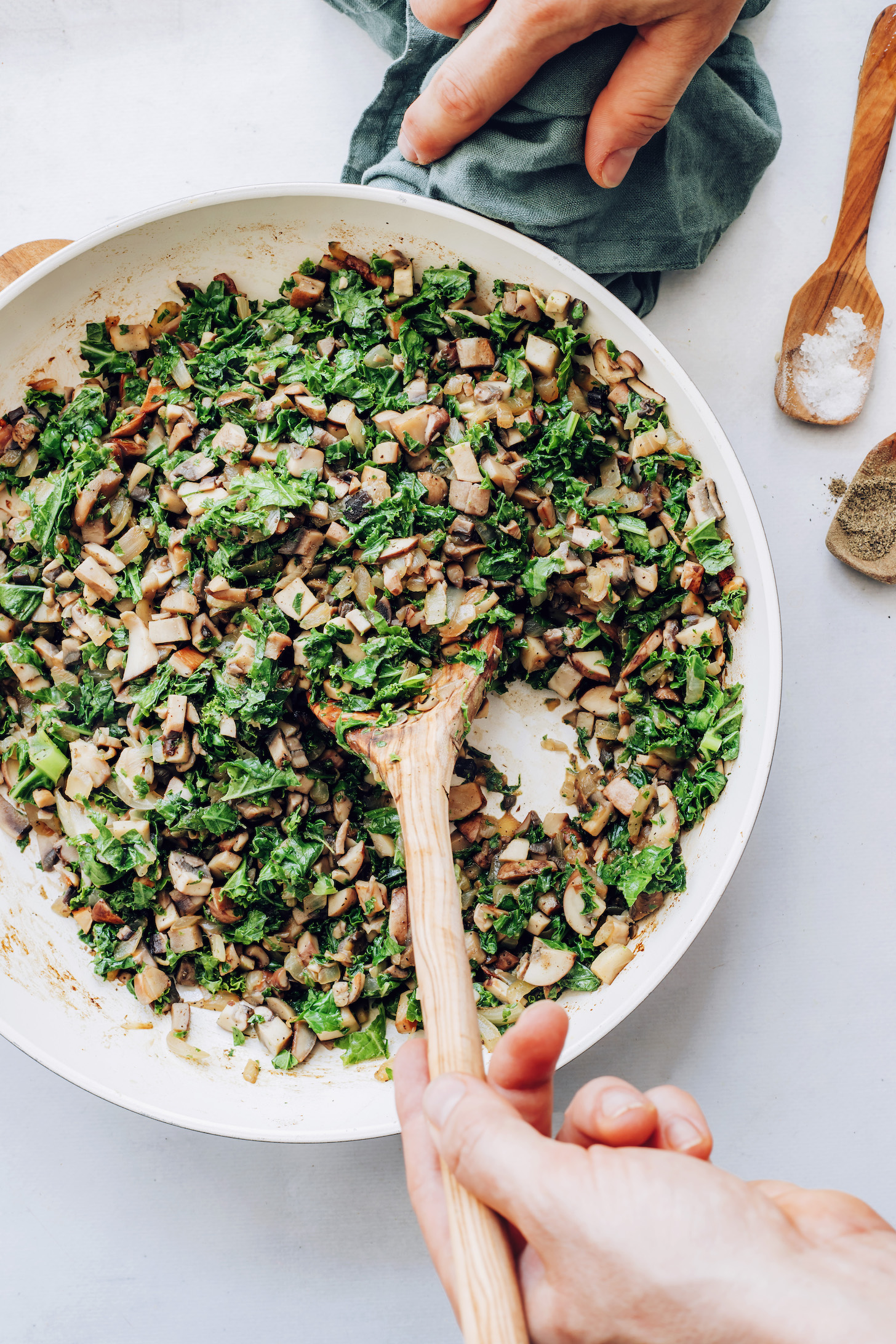 Skillet of sautéed kale, mushrooms, and onions