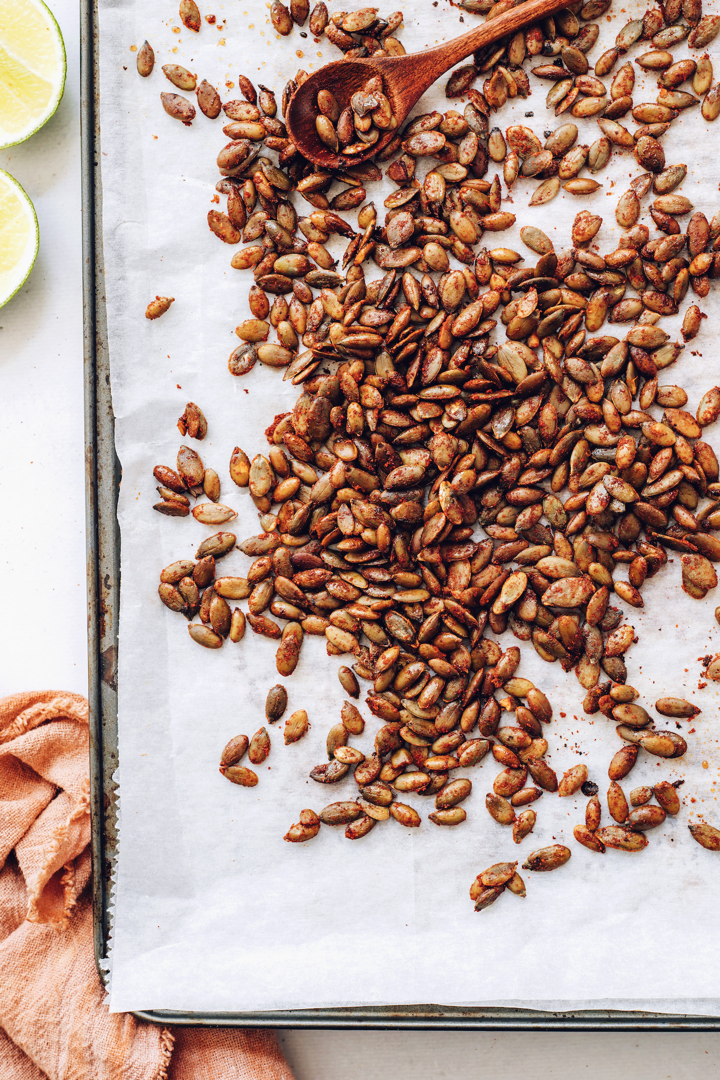 Chili lime roasted pepitas on a baking sheet