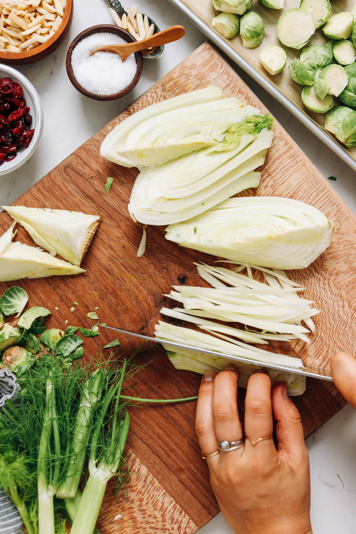 Thinly slicing a fennel bulb