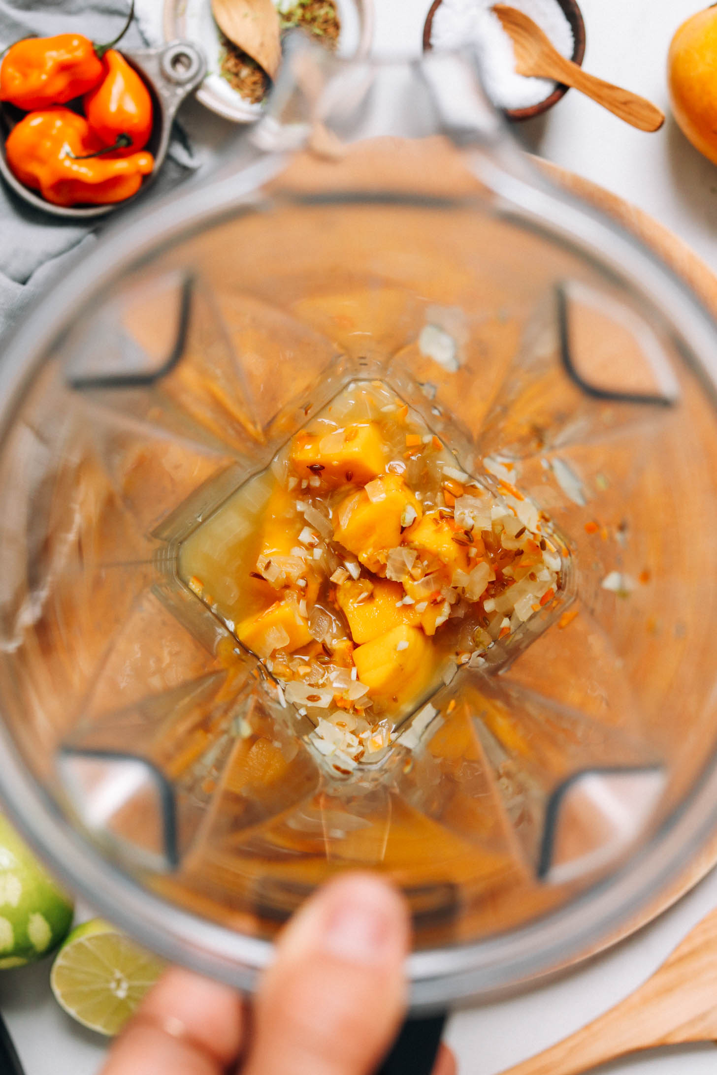 Sautéed onion, cumin seeds, habanero, mango chunks, lime juice, and water in a blender
