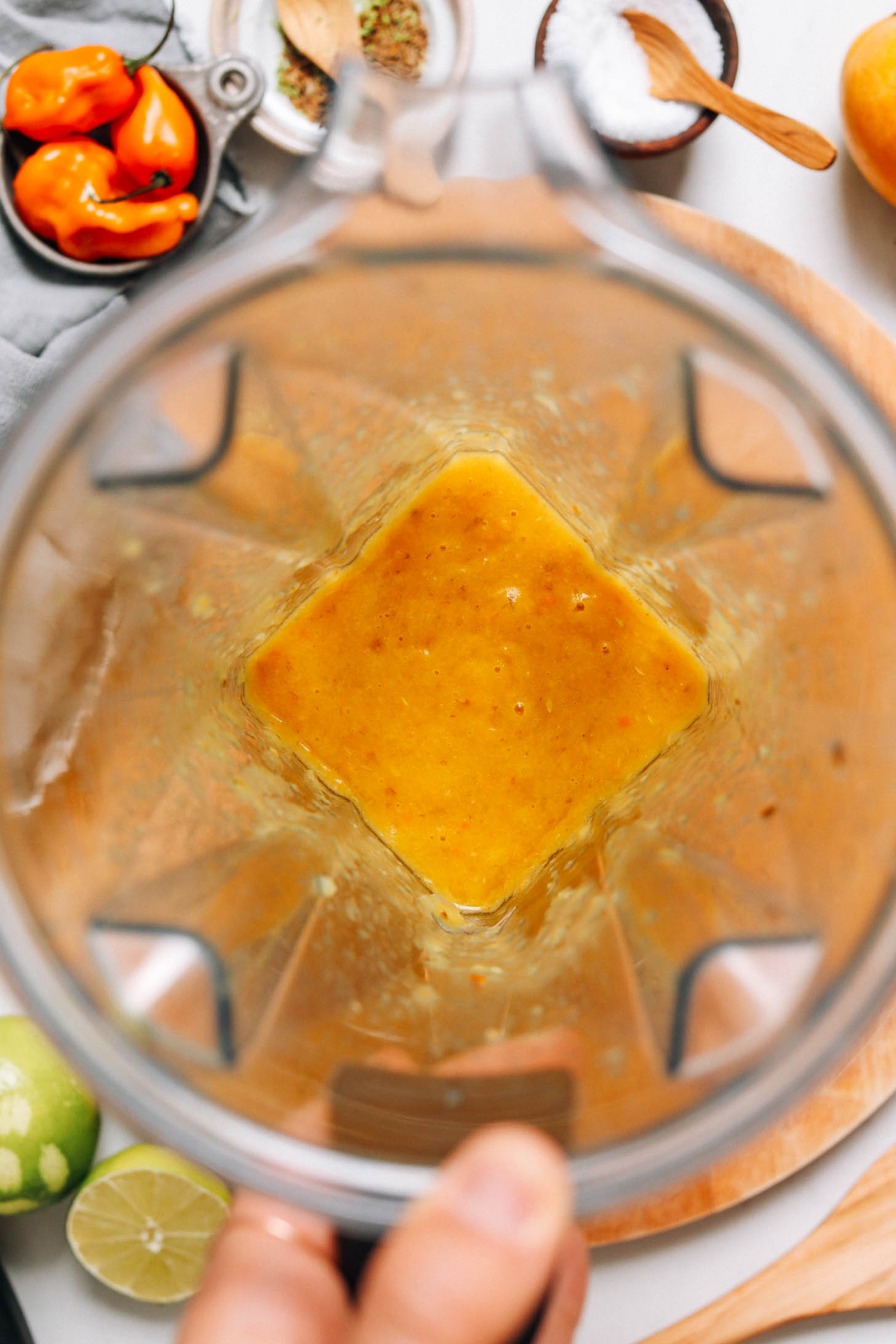 Freshly blended mango hot sauce in a blender
