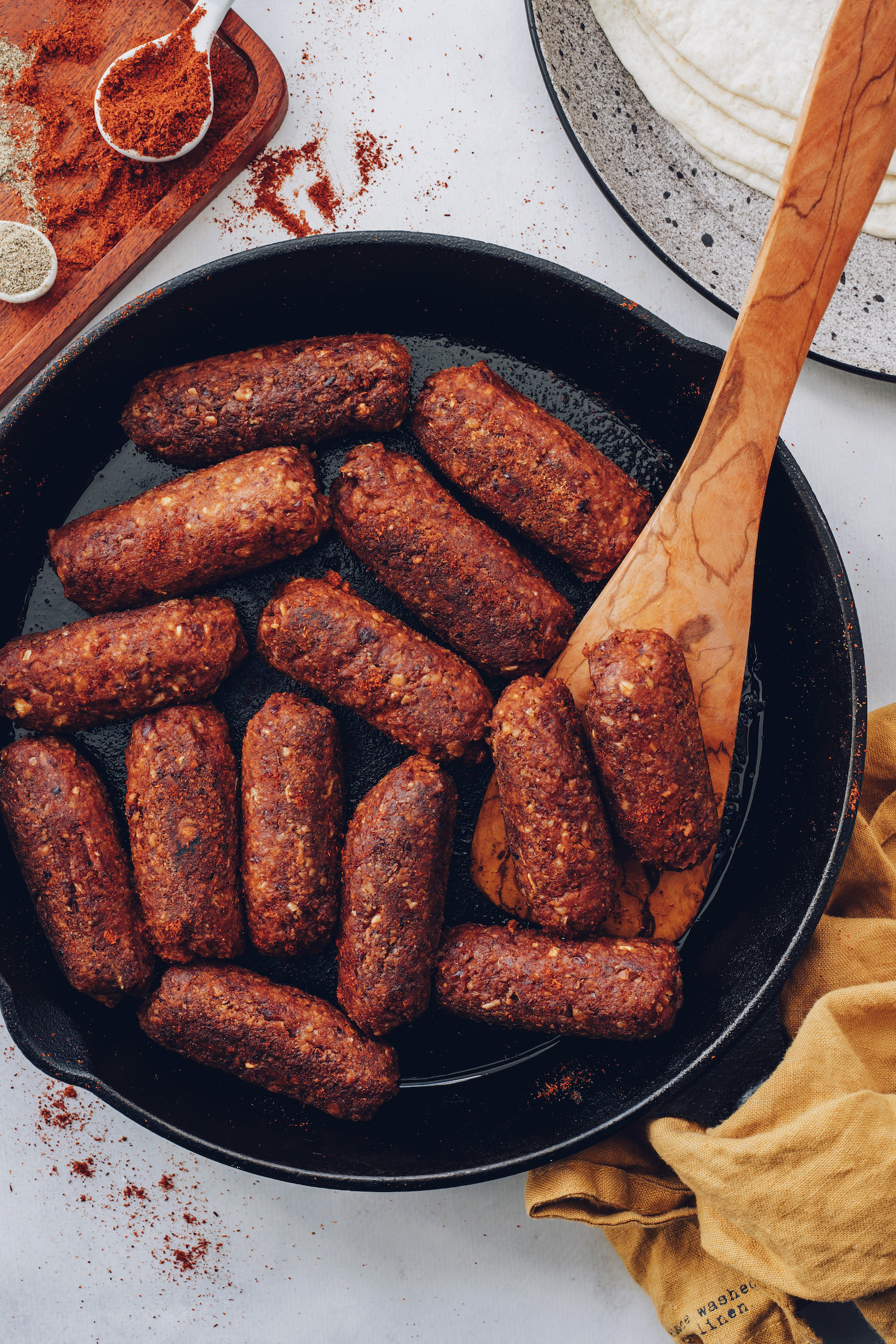 Cooking vegan chorizo links in a skillet
