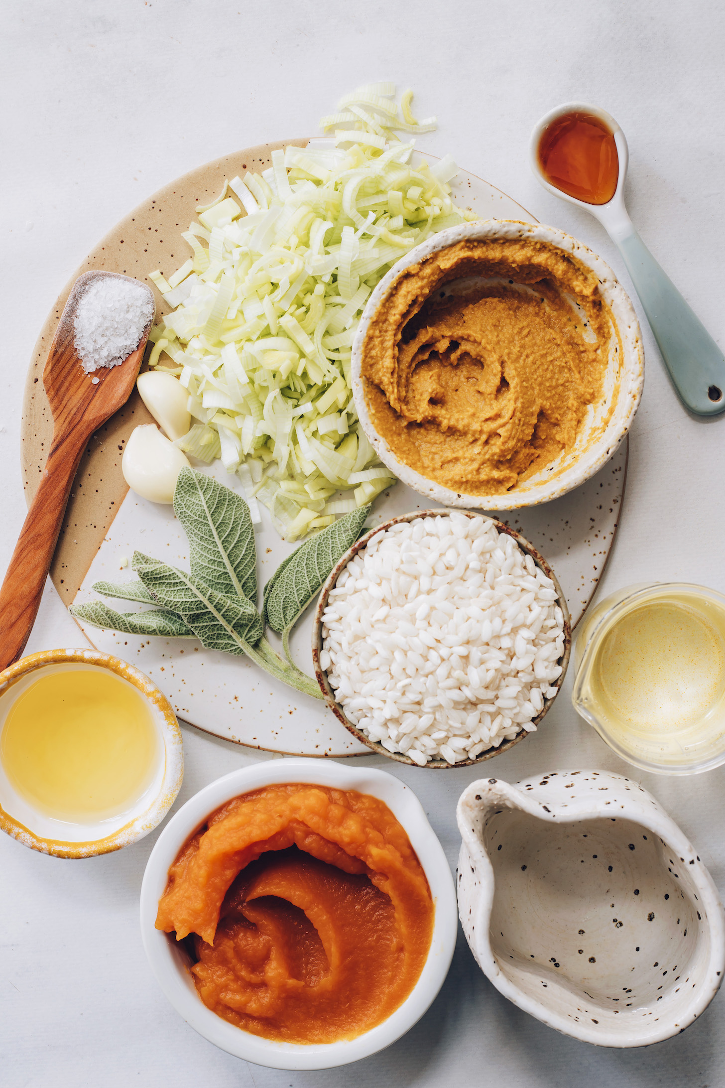 Leeks, garlic, sage, salt, miso paste, arborio rice, white wine, water, pumpkin purée, and olive oil