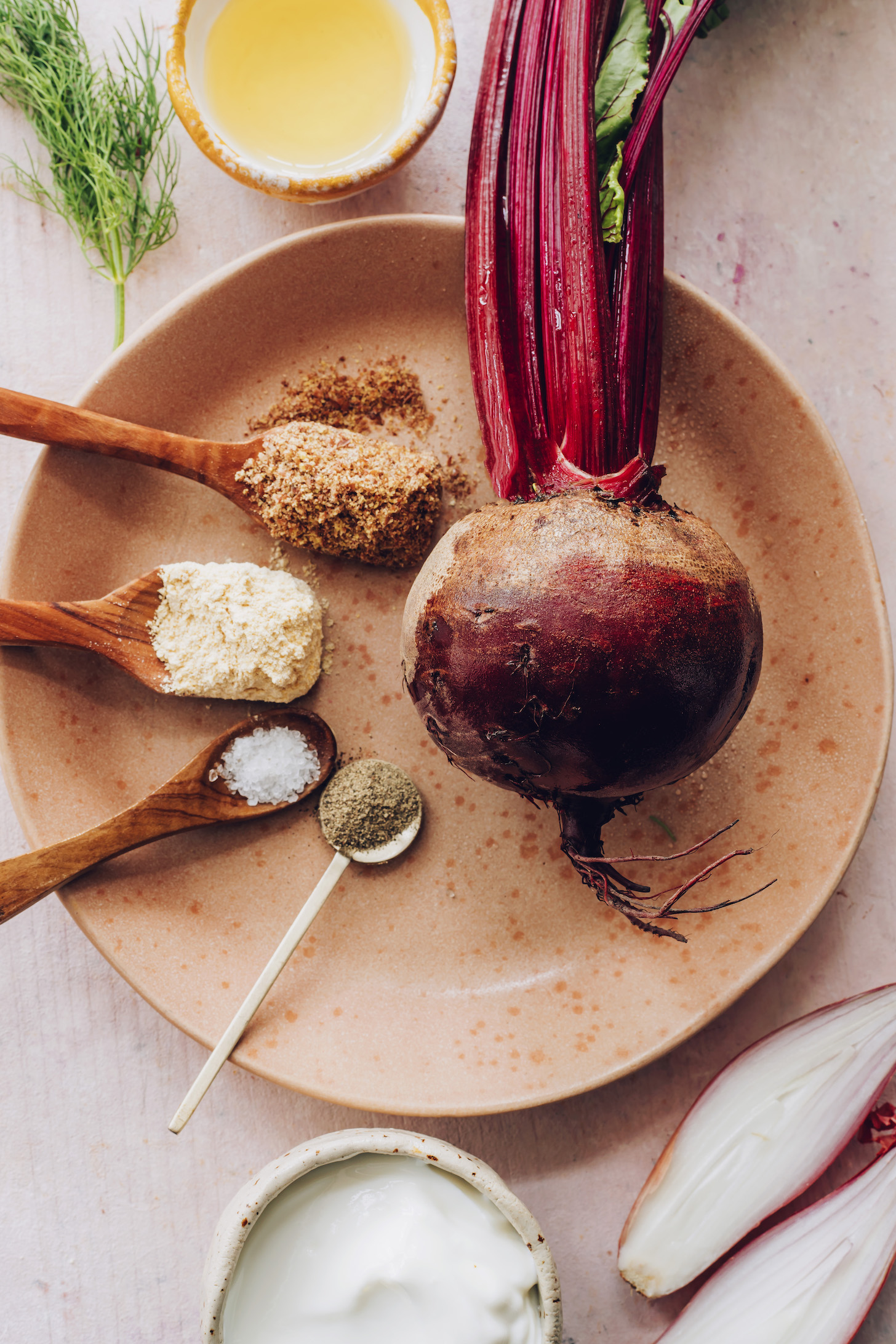 Beet, shallot, yogurt, salt, pepper, chickpea flour, flaxseed meal, dill, and avocado oil