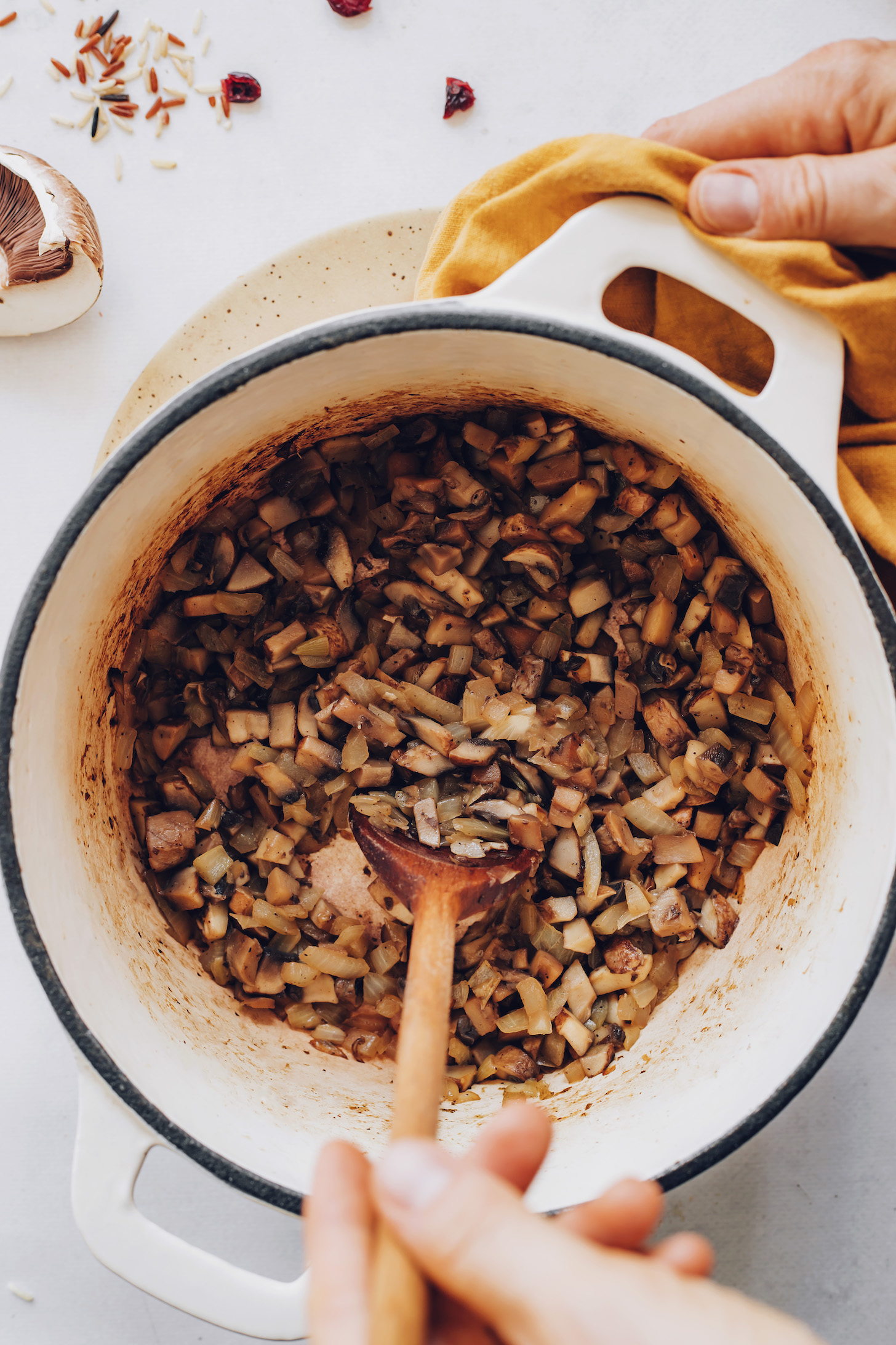 Sautéing mushrooms and onions in a Dutch oven