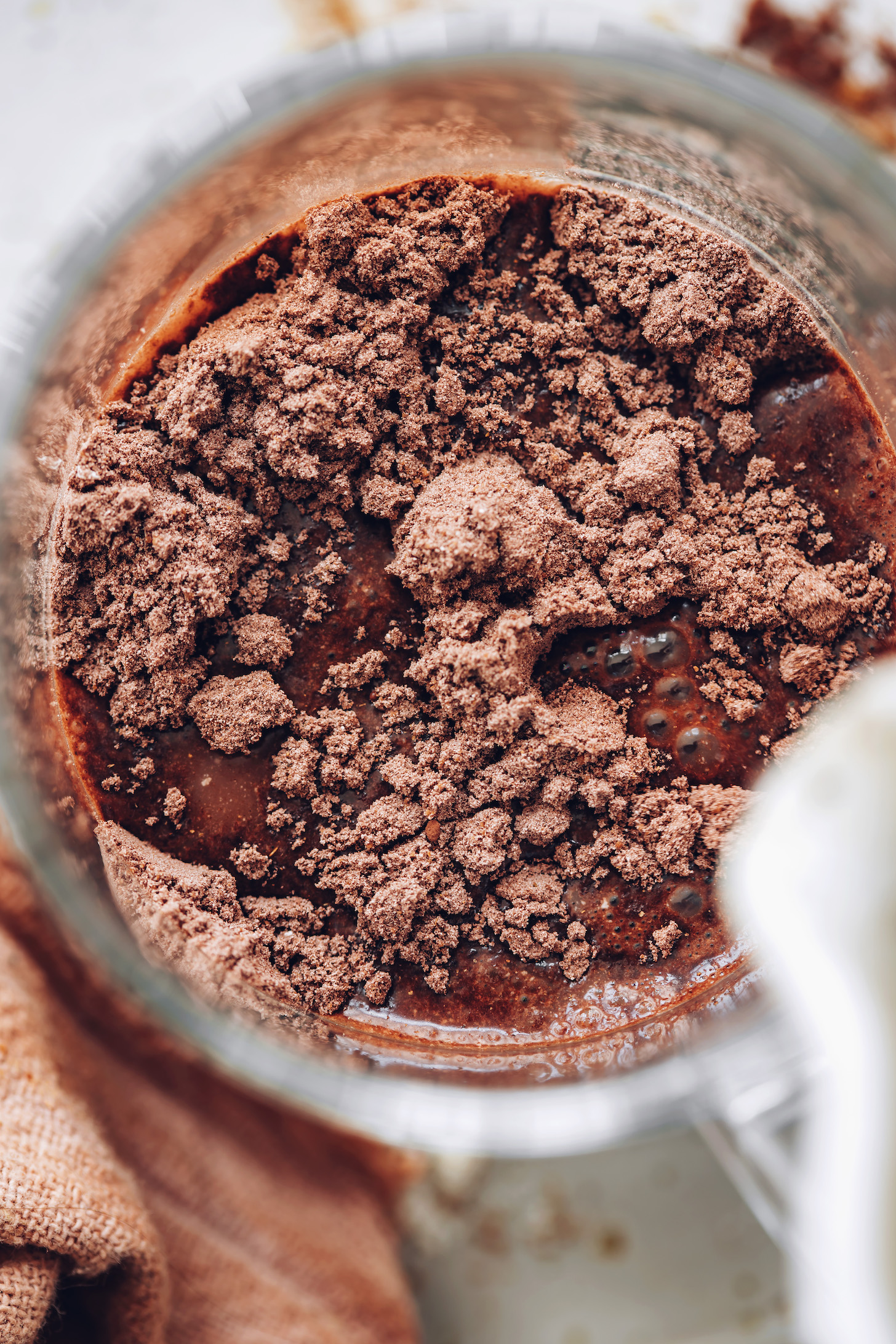 Mug of hot water and instant hot chocolate mix