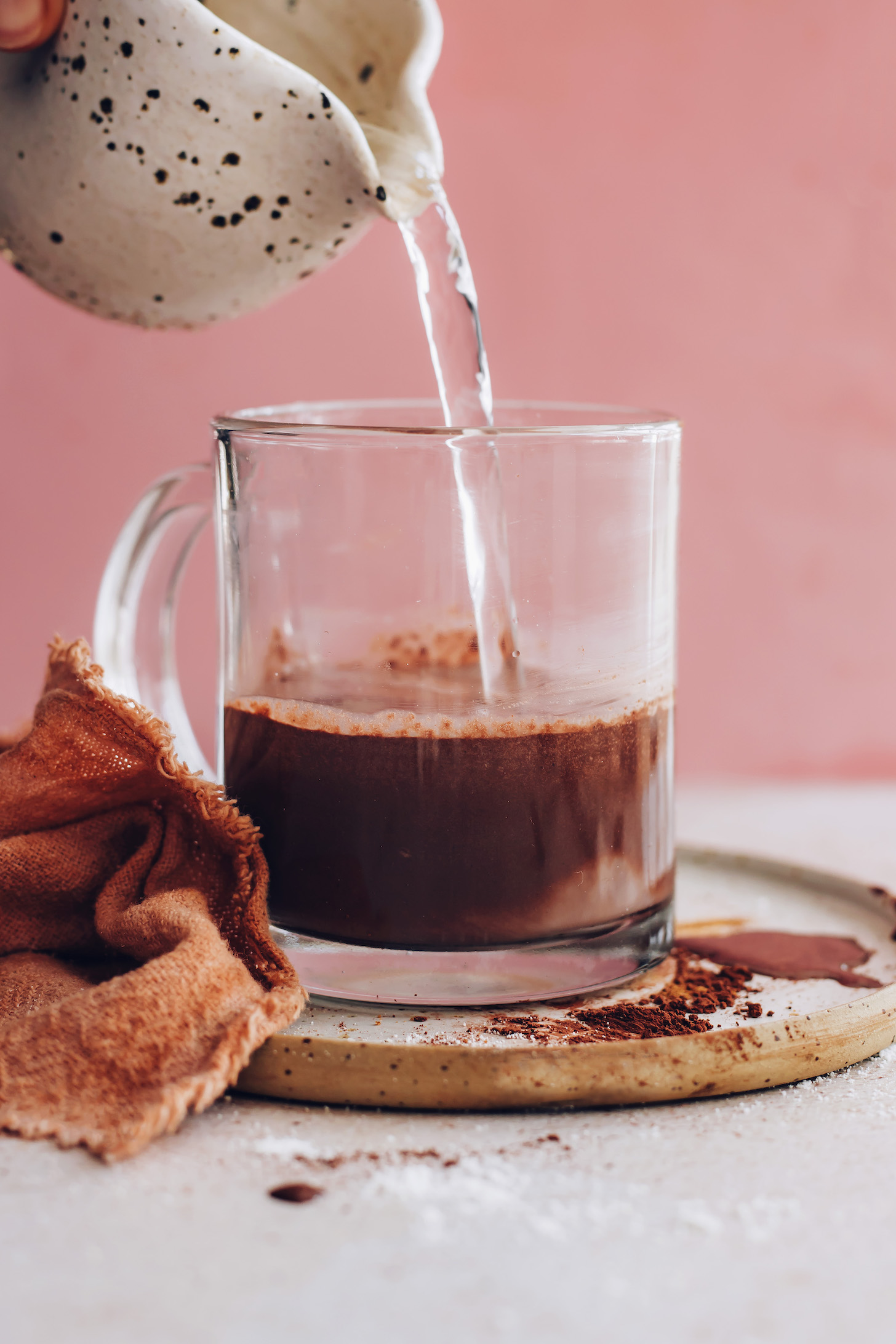 Pouring hot water to make instant hot chocolate
