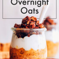 Jar of vegan and gluten-free pumpkin pie overnight oats with coconut yogurt and granola on top