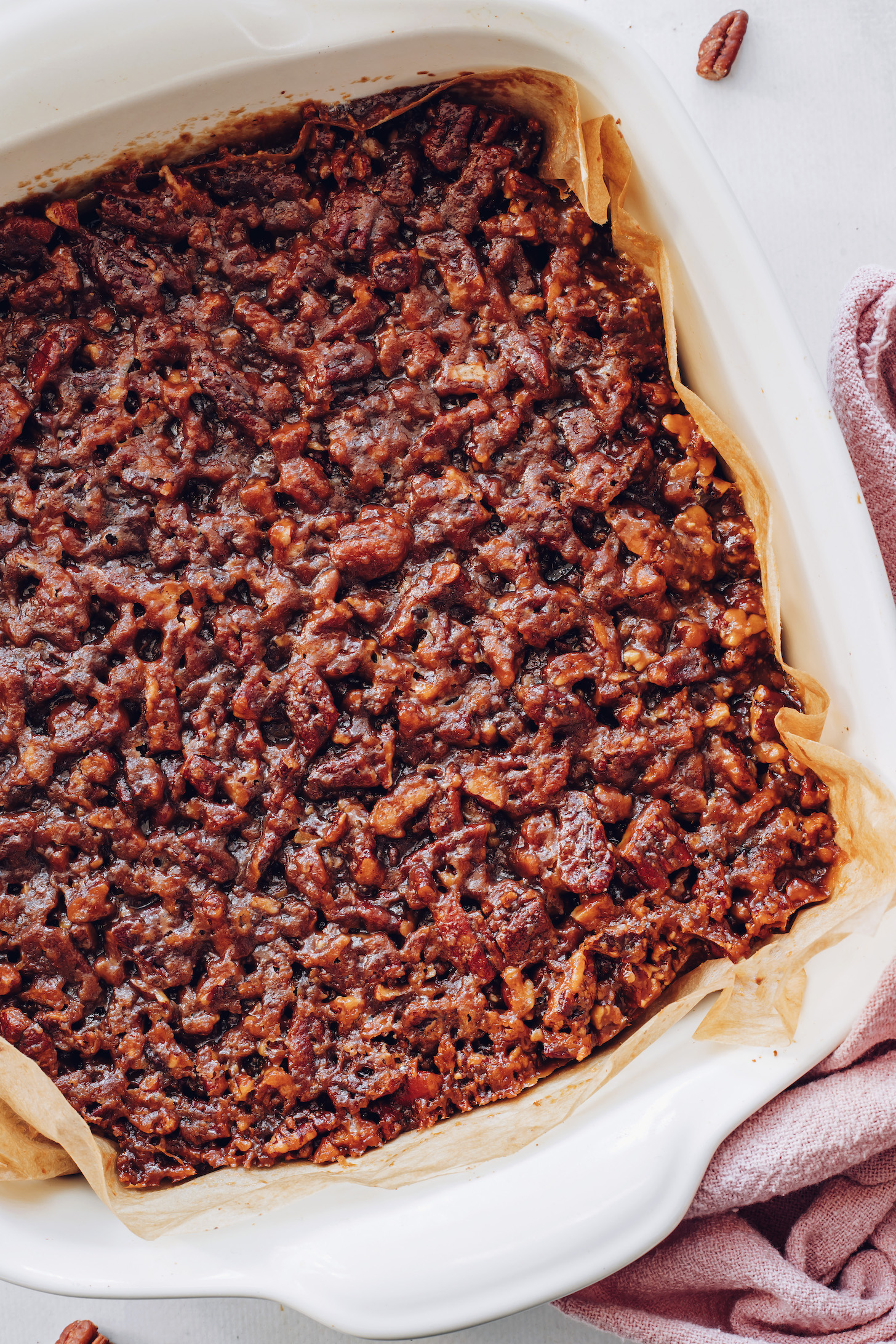 Crispy, buttery pecan layer of pecan pie bars