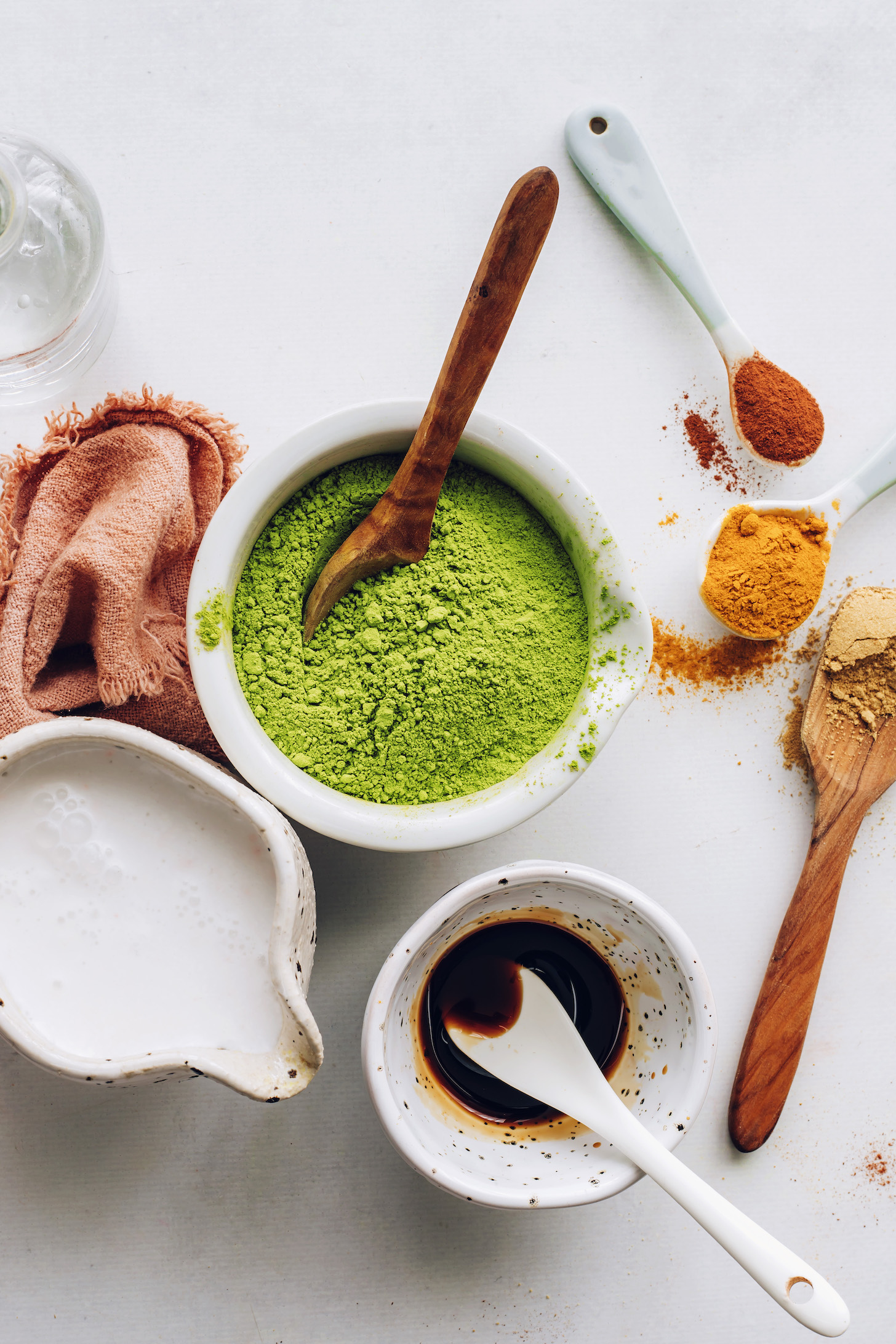 Matcha powder, cinnamon, turmeric, ginger, maple syrup, and coconut milk