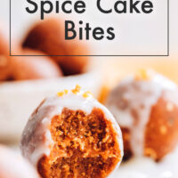 A vegan, gluten-free, no-bake pumpkin spice cake bite with a bite taken out of it