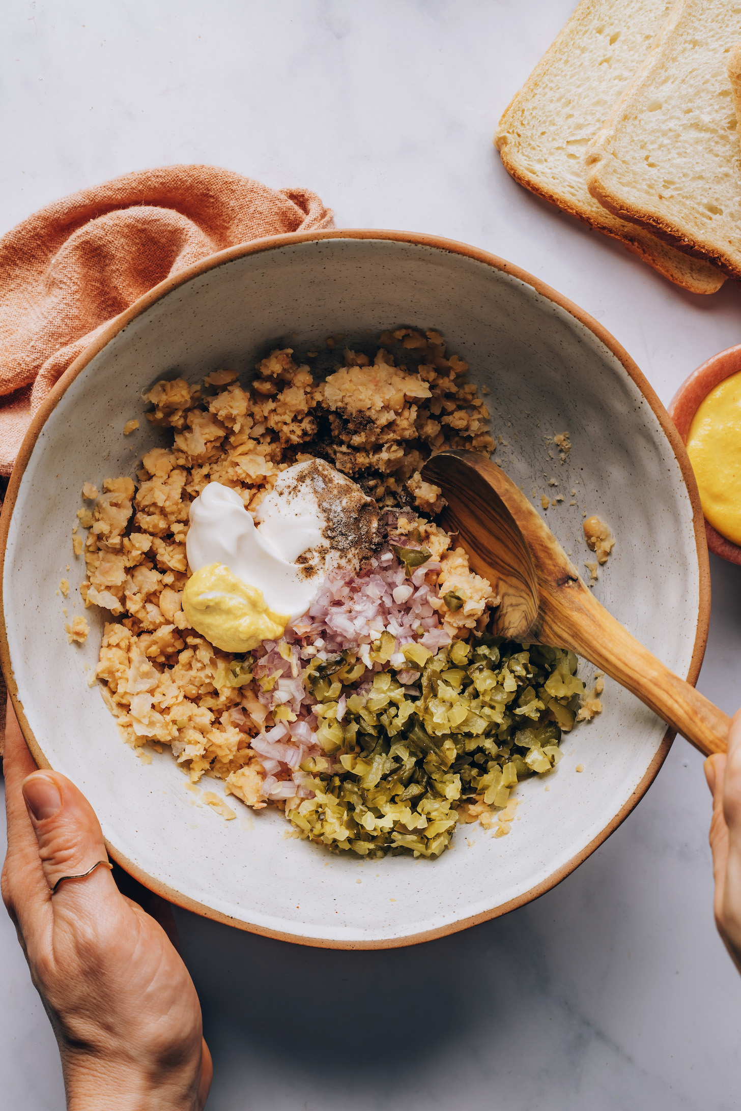 Mashed chickpeas, vegan mayo, mustard, shallot, dill pickles, salt, and pepper
