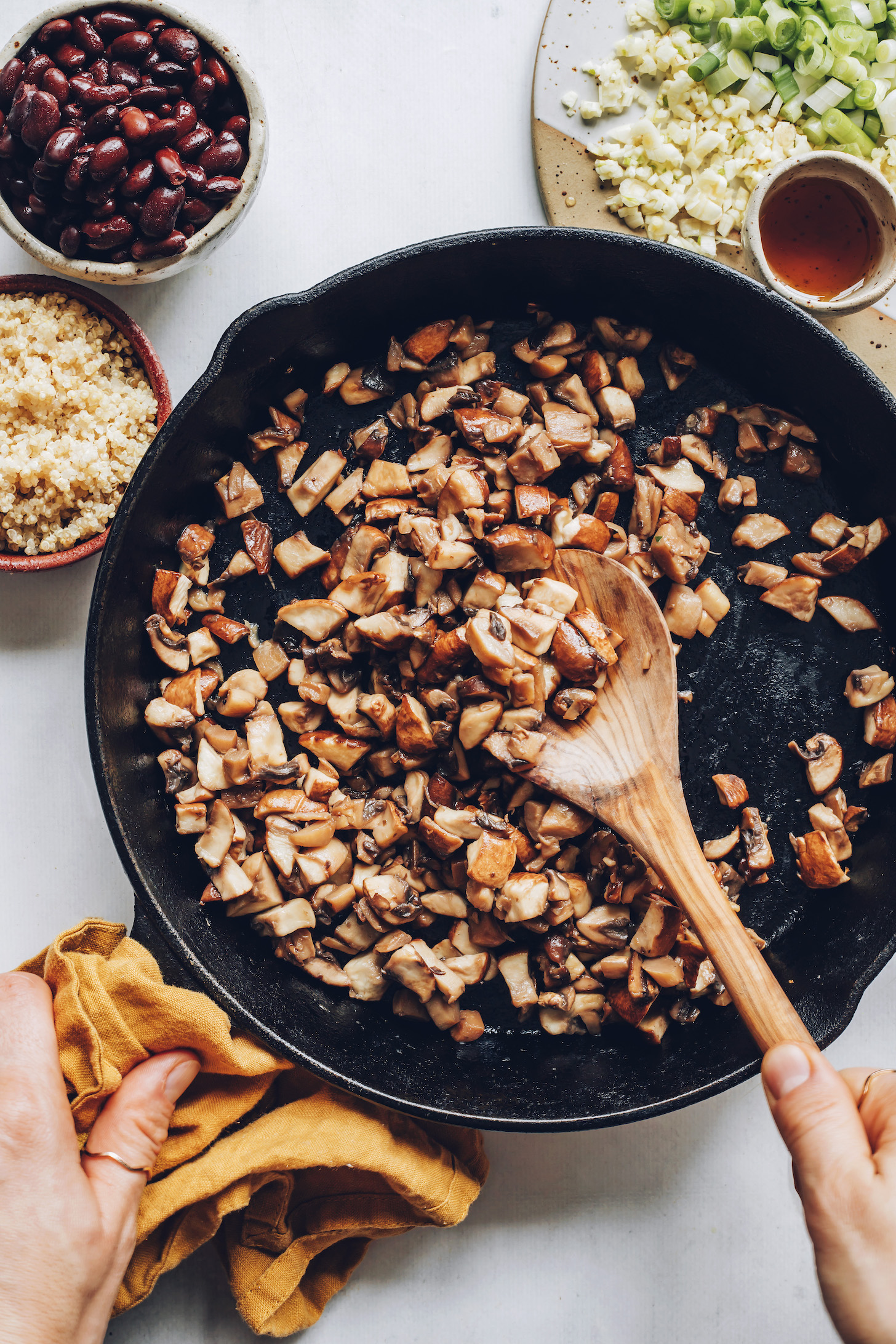 Pan of chopped mushrooms sautéed in sesame oil
