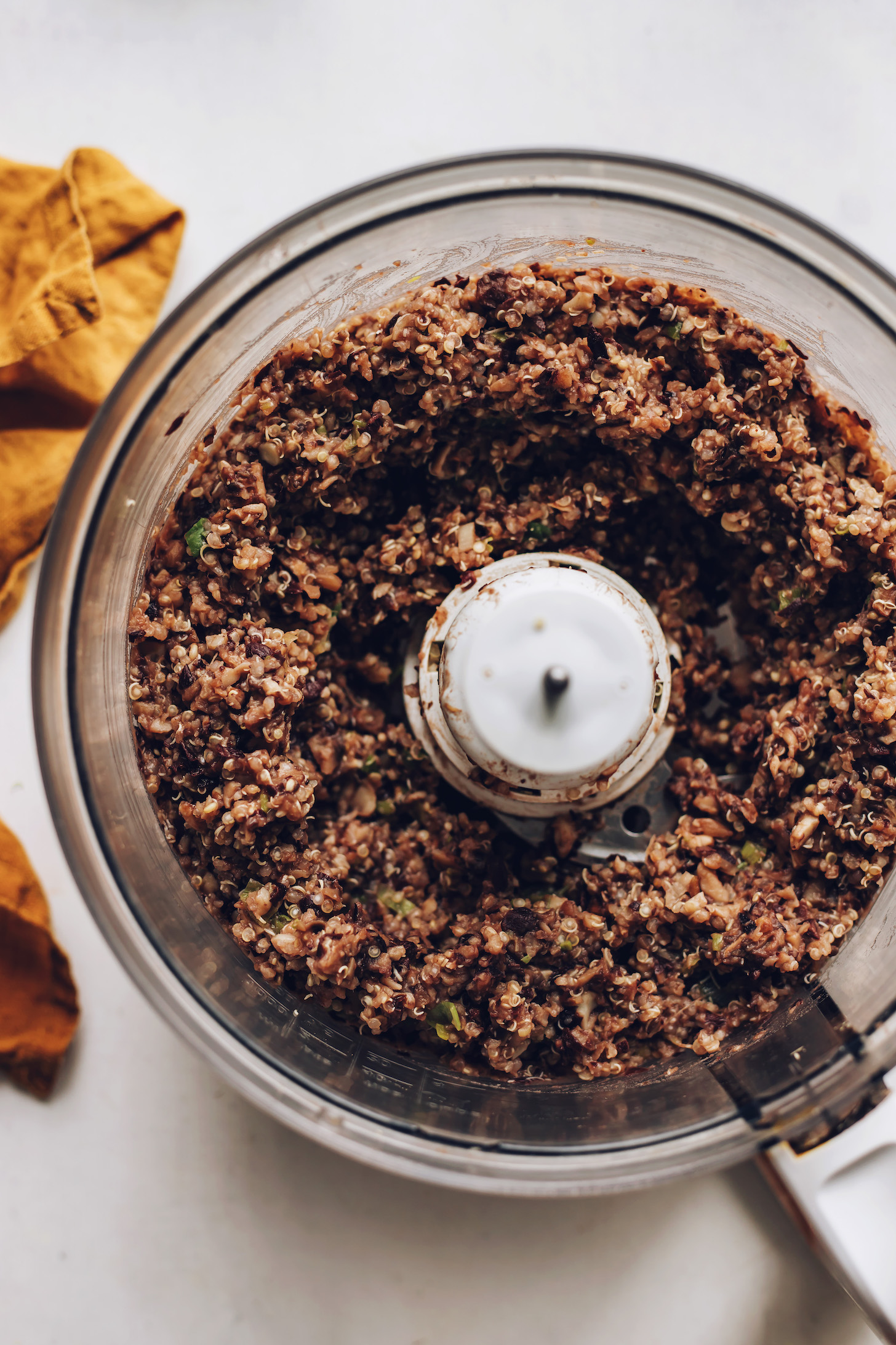 Vegan meatball dough mixture in a food processor