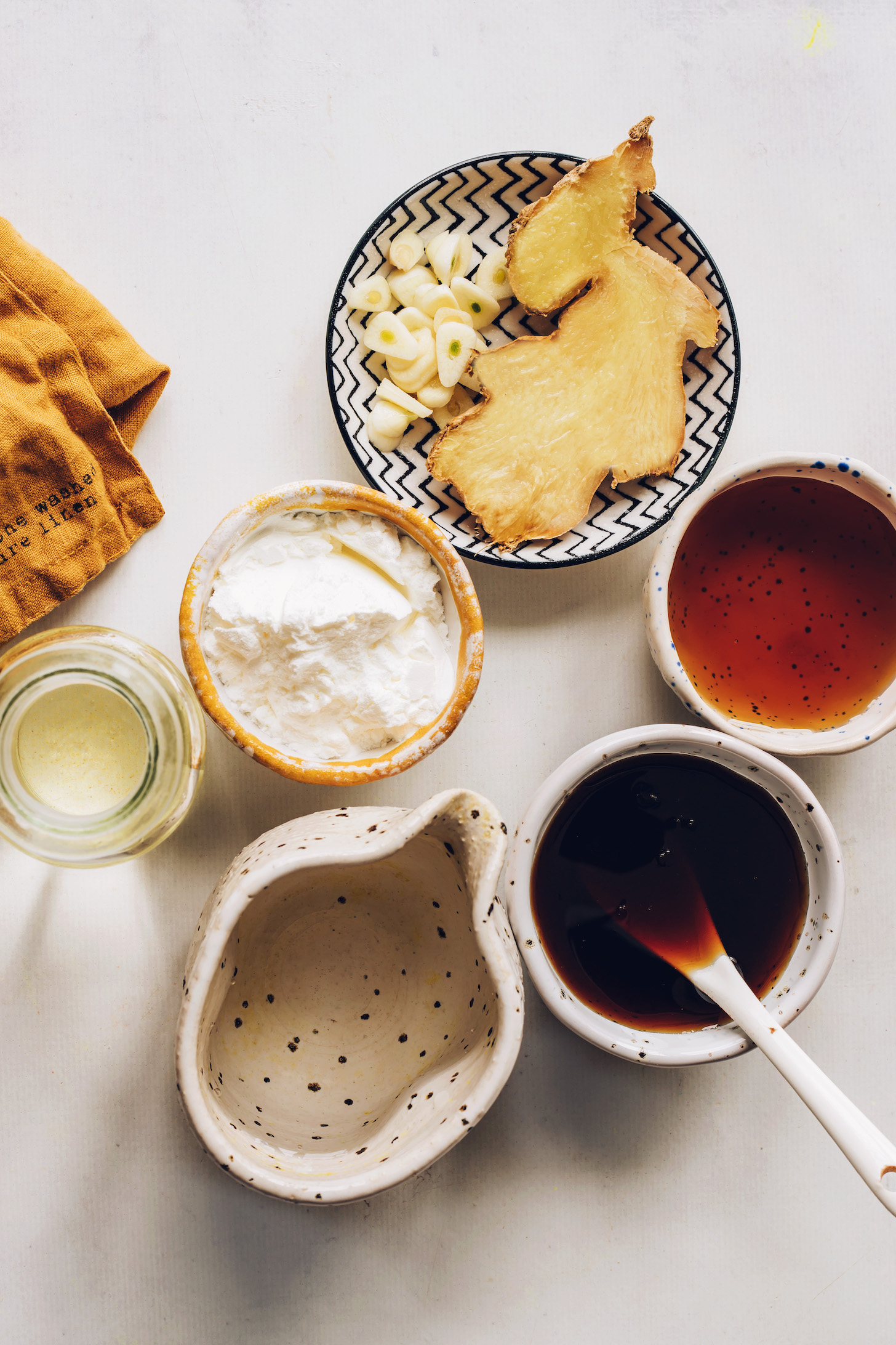 Ginger, garlic, cornstarch, rice vinegar, water, tamari, and maple syrup