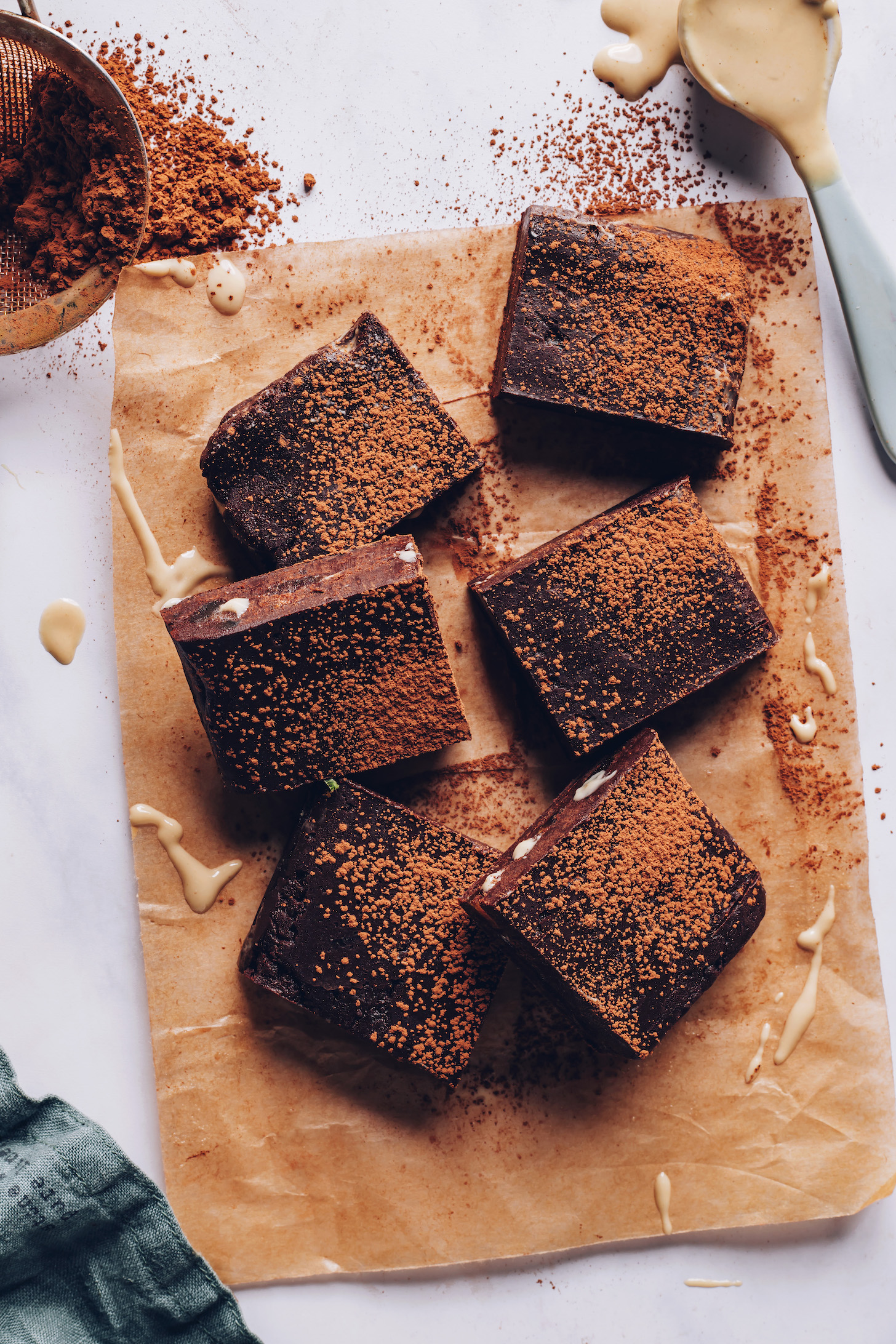 Tahini date chocolate bars dusted with cocoa powder