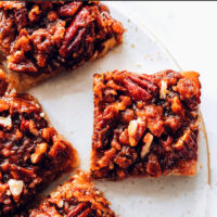 Plate of vegan and gluten-free pecan pie bars