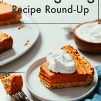 Slice of vegan pumpkin pie with non-dairy whipped cream on top