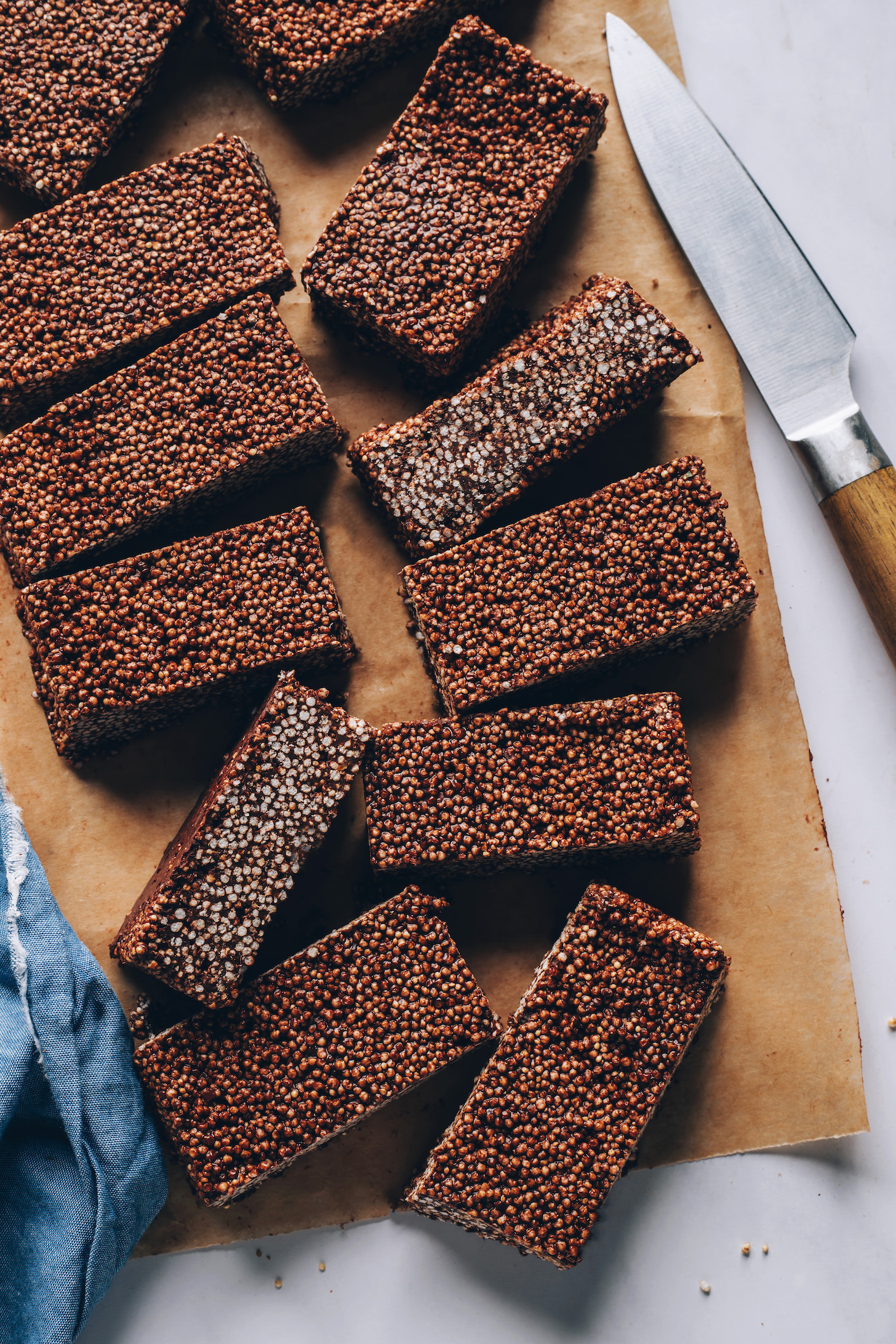 Crispy chocolate amaranth bars on a piece of parchment paper