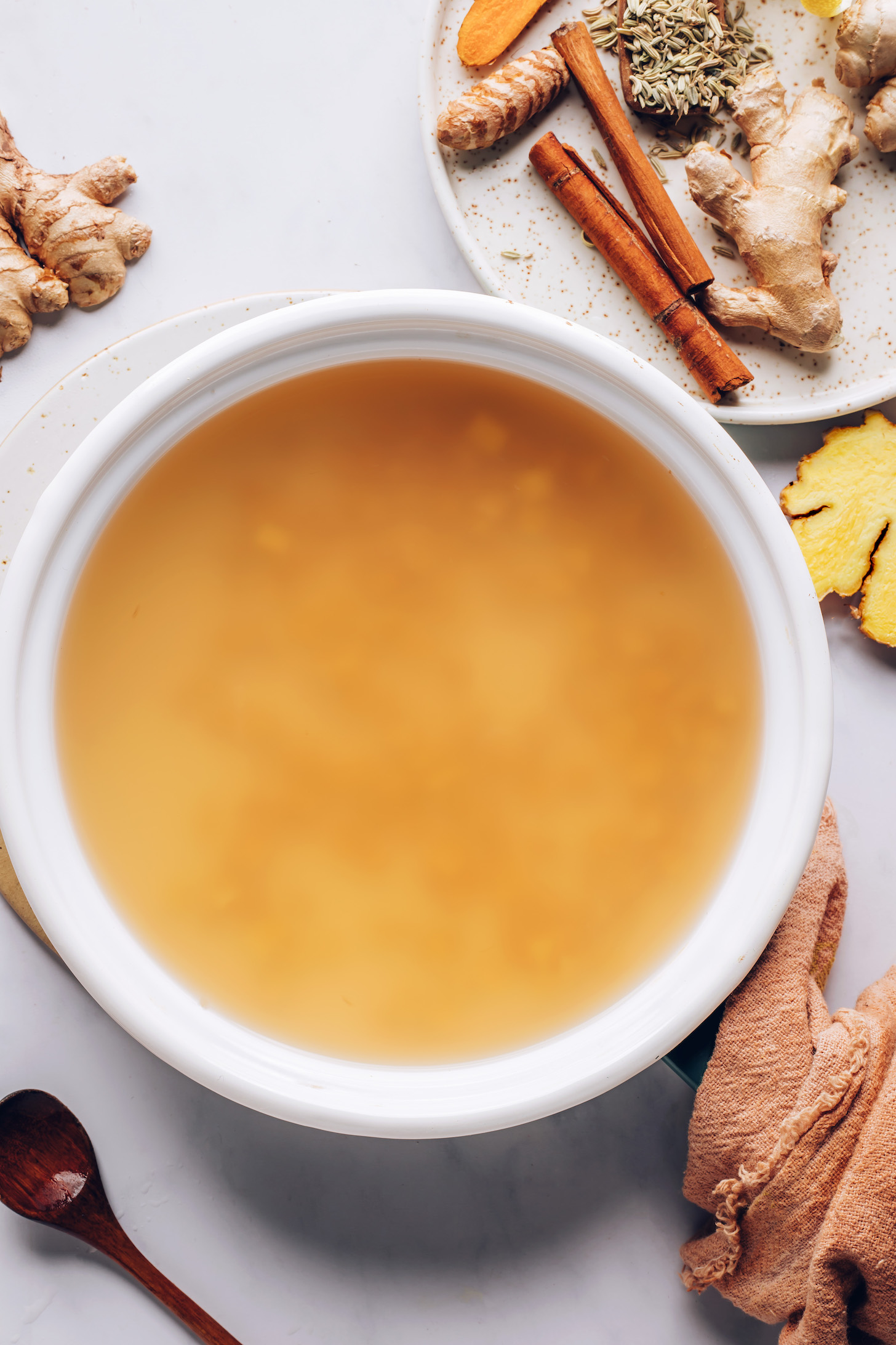 Simmering ginger in a saucepan
