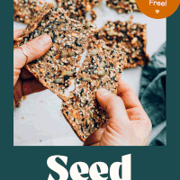 Breaking apart a cracker with text reading nut-free and gluten-free everything bagel seed crackers